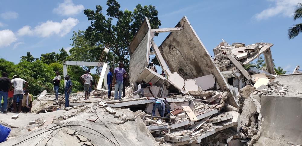 Haiti earthquake death toll rises to 1,297 as country braces for tropical storm Grace