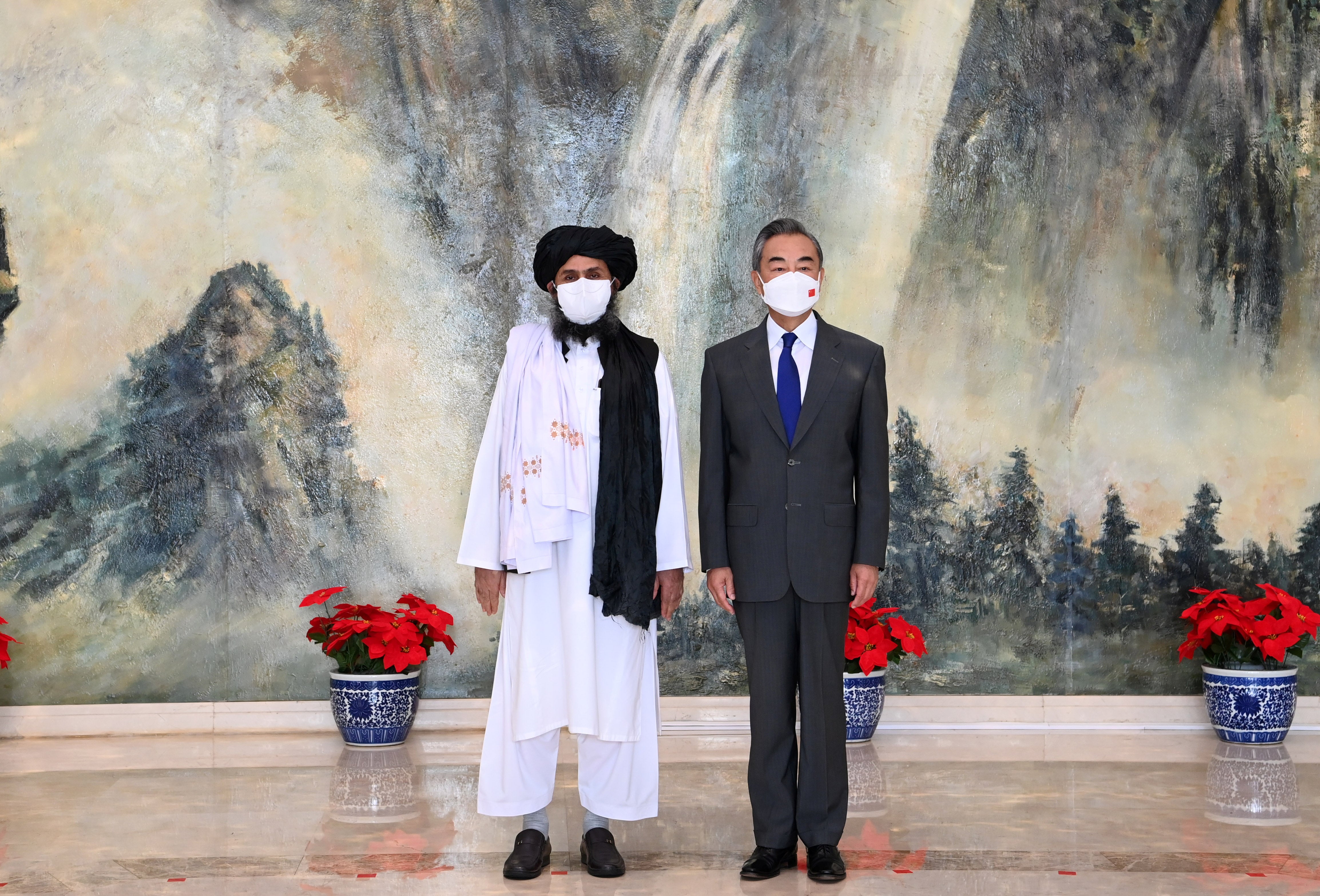 Chinese State Councilor and Foreign Minister Wang Yi meets with Mullah Abdul Ghani Baradar in July