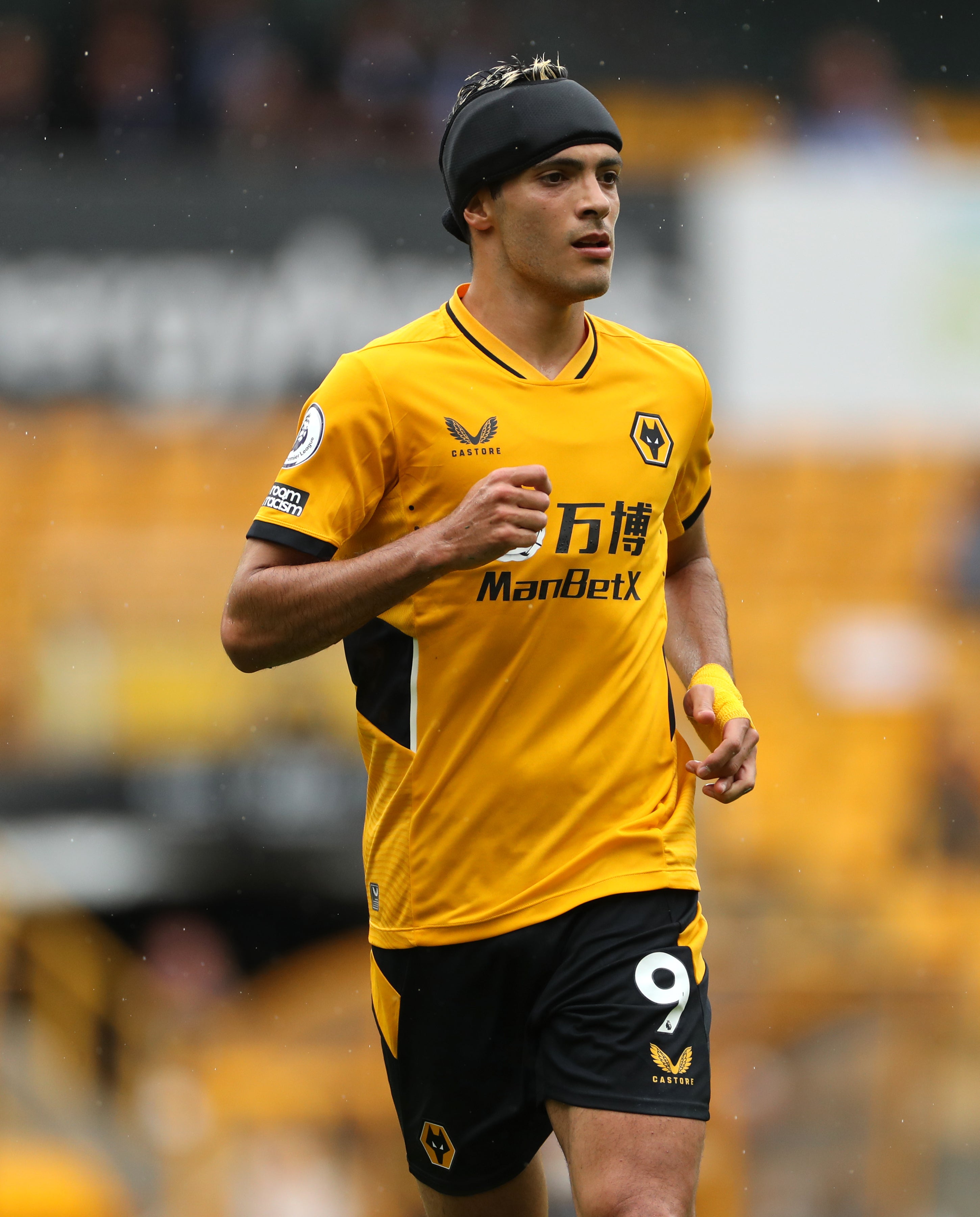 Raul Jimenez sports his protective headguard following the fractured skull he suffered last year (Bradley Collyer/PA).