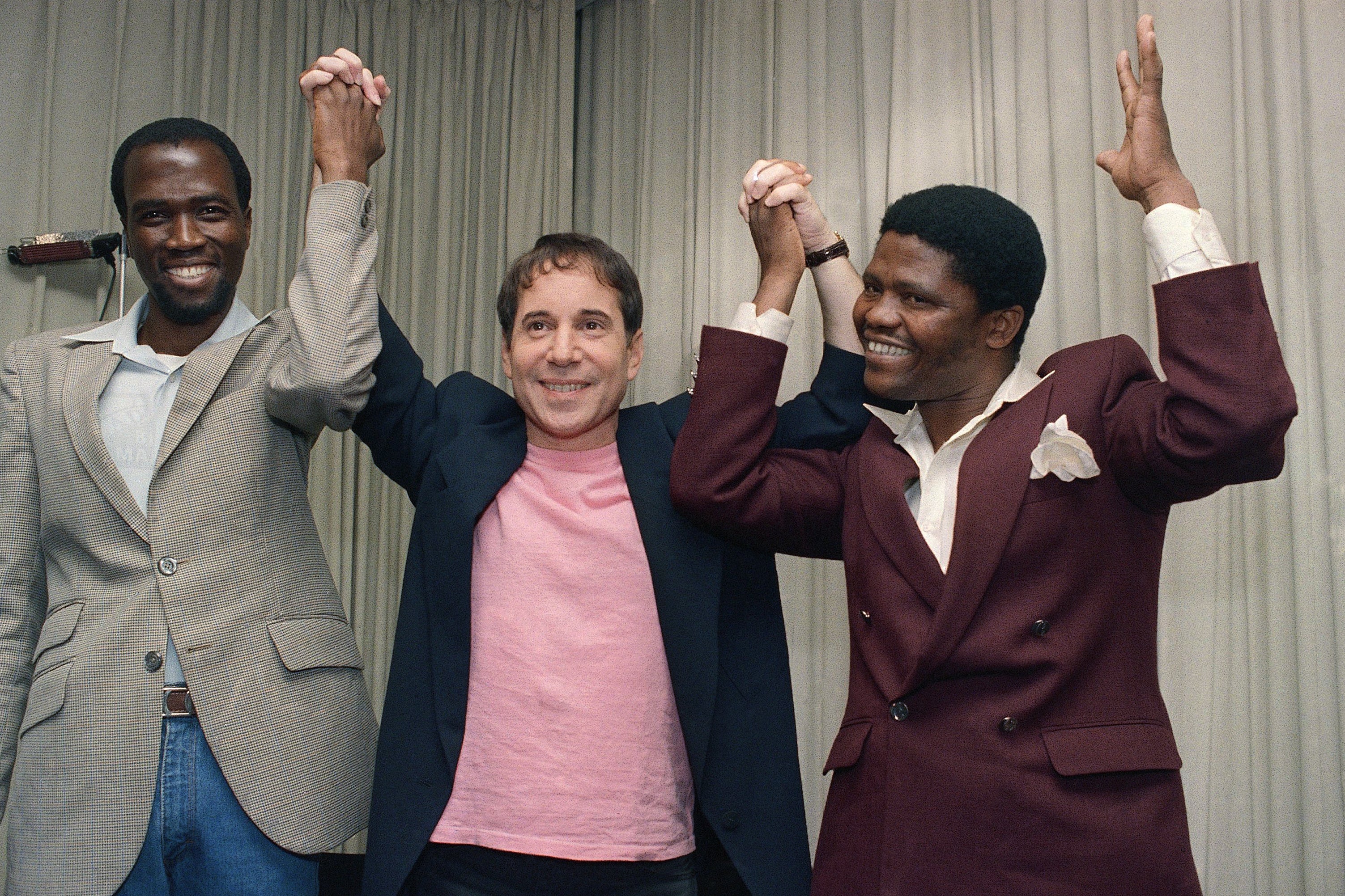 Paul Simon with Albert Mazibuko, left, and Joseph Shabalala of Ladysmith Black Mambazo