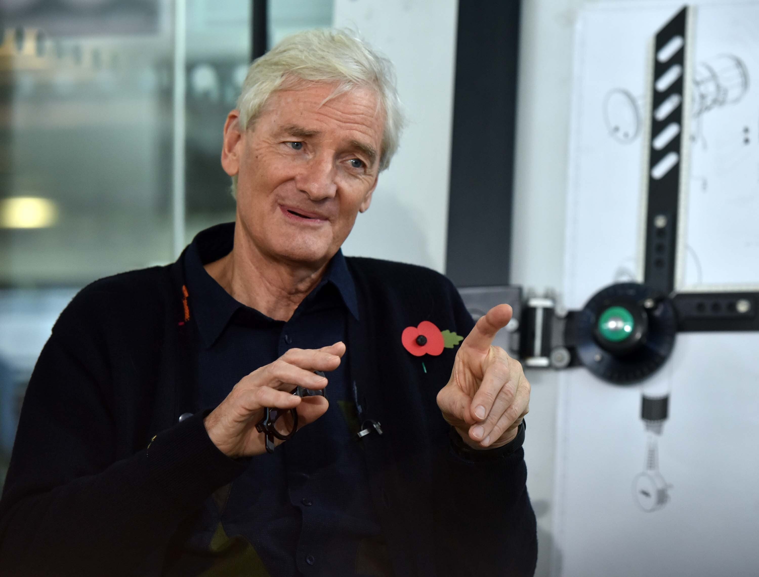 Sir James Dyson has called on the Government to lead workers back into offices in order to restore the ‘competitiveness’ of the UK’s firms (Jeff Overs/PA)