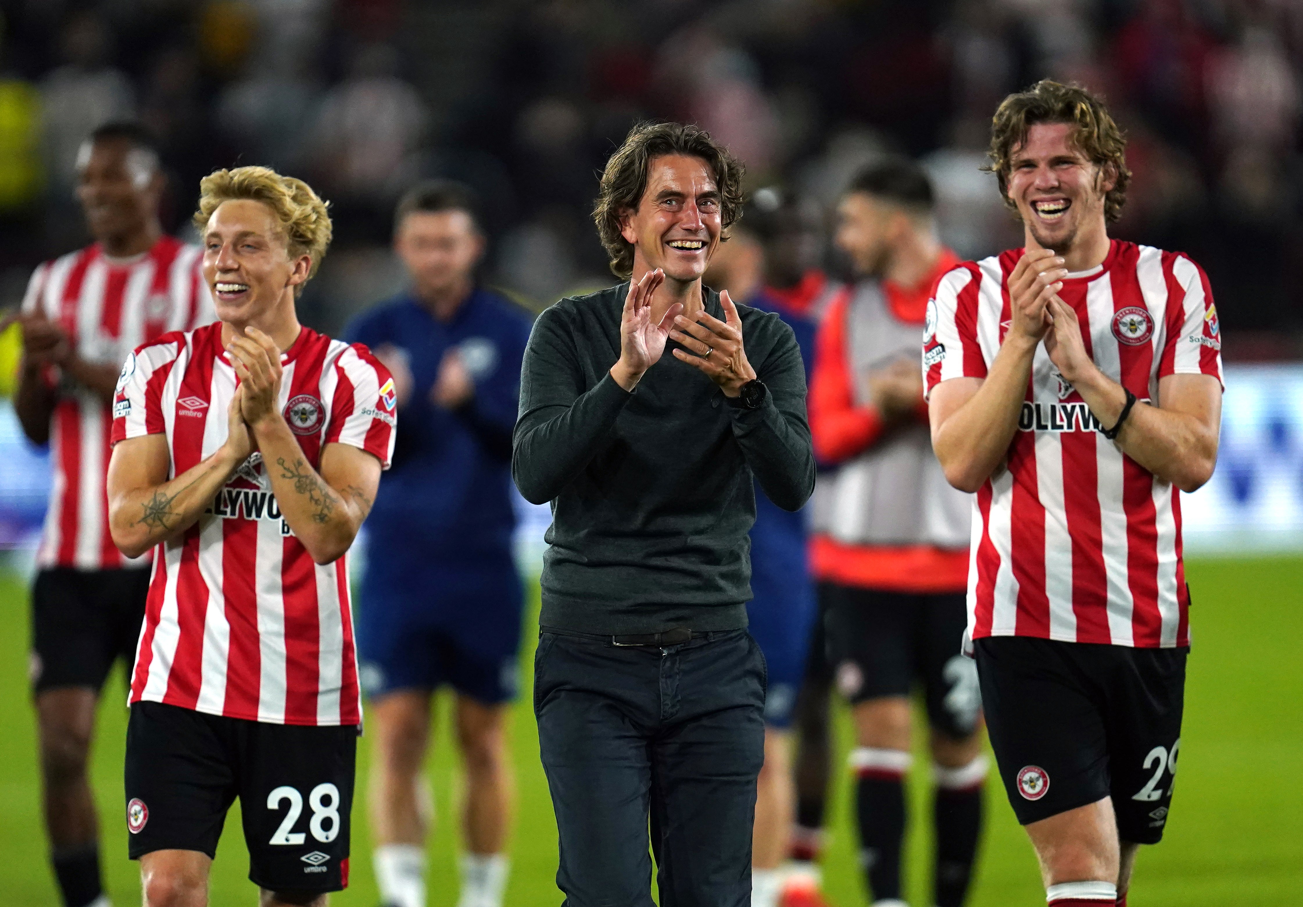 Brentford head coach Thomas Frank (centre) led the squad on a walkabout after the win over Arsenal (Nick Potts/PA)