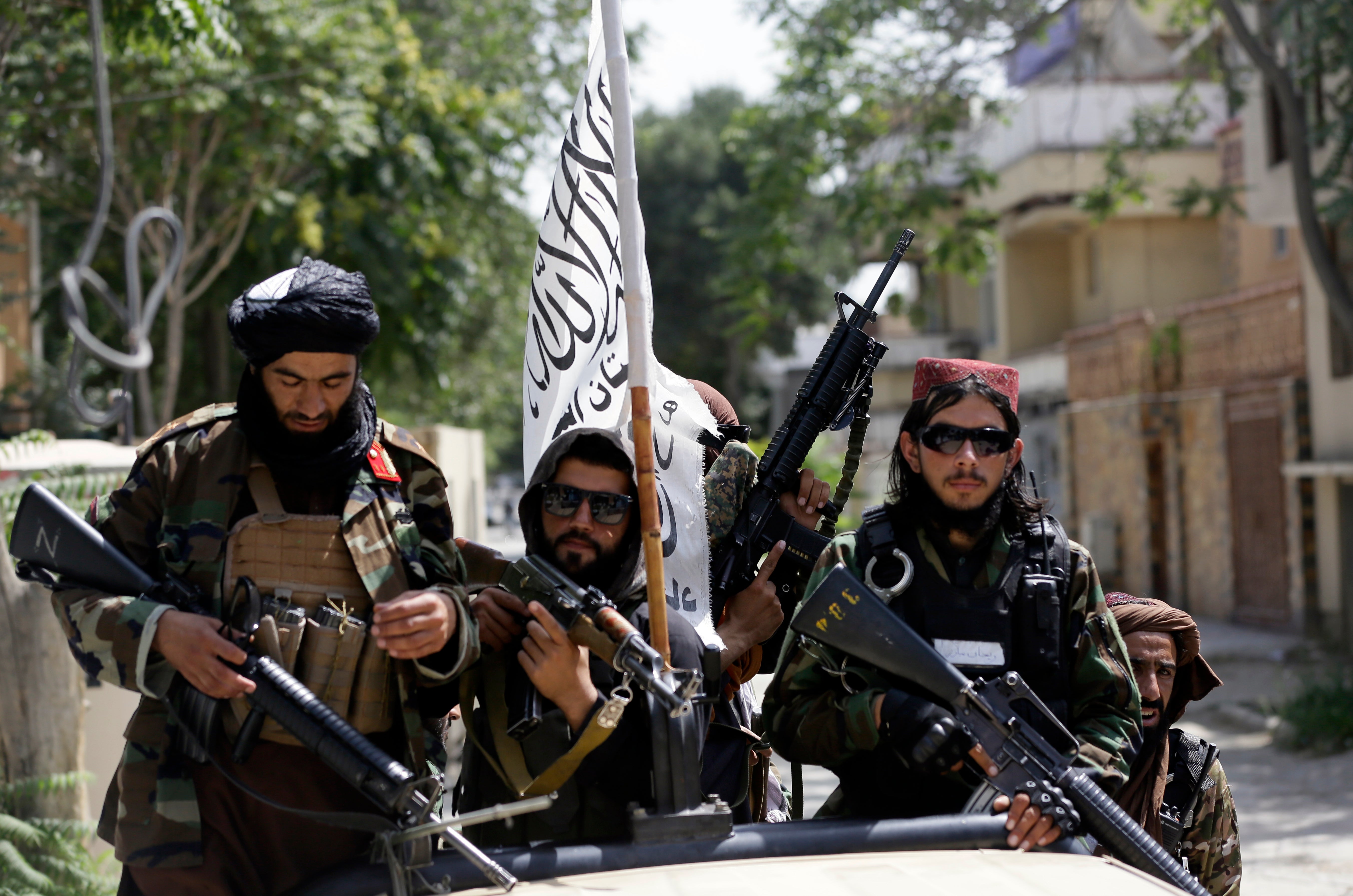 Taliban fighters patrol the streets of Kabul on Thursday