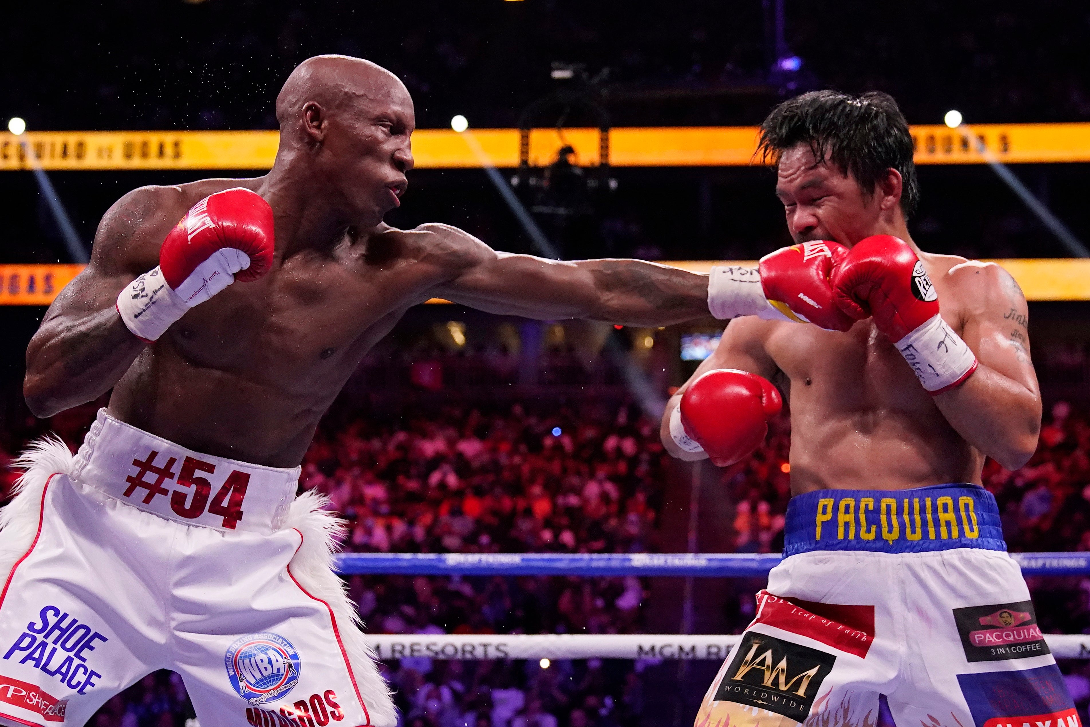 Yordenis Ugas beats Manny Pacquiao by unanimous decision to keep WBA title