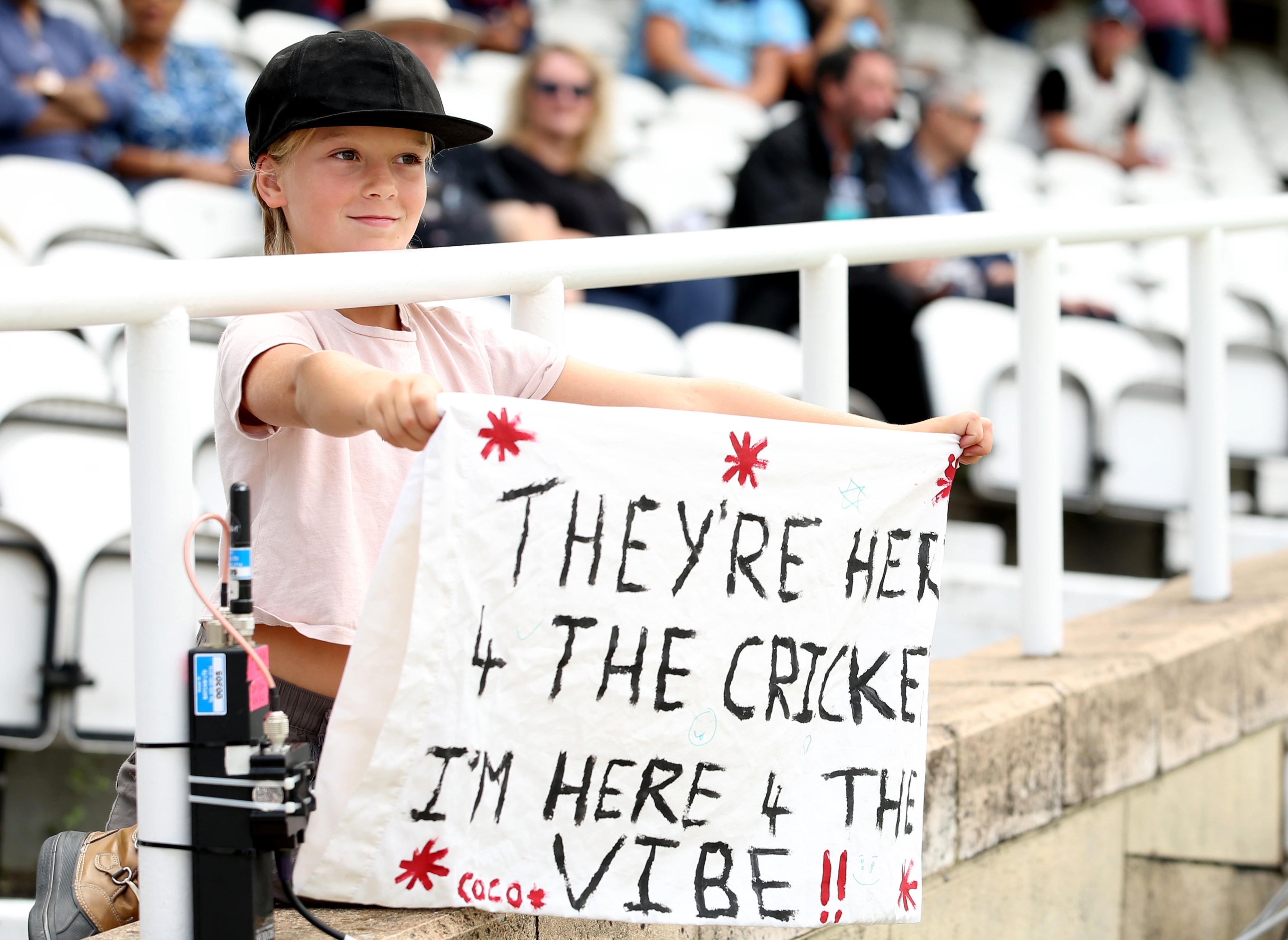 A fan in the stands holds up a sign during The Hundred Eliminator women’s match at the Kia Oval.