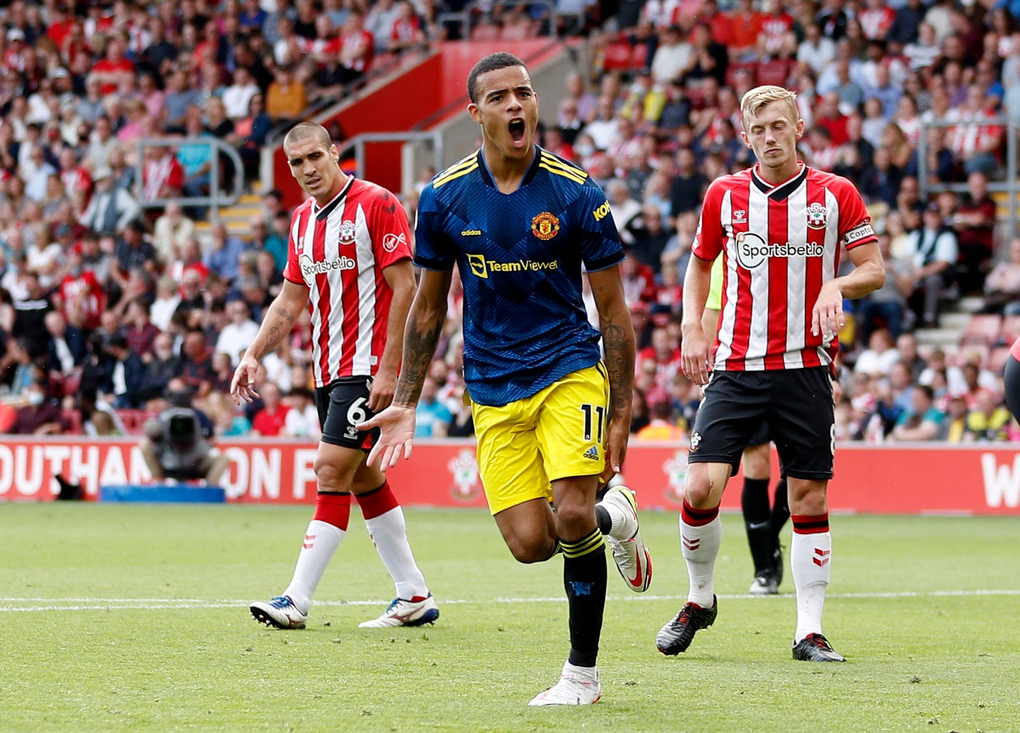 Mason Greenwood celebrates scoring for Manchester United