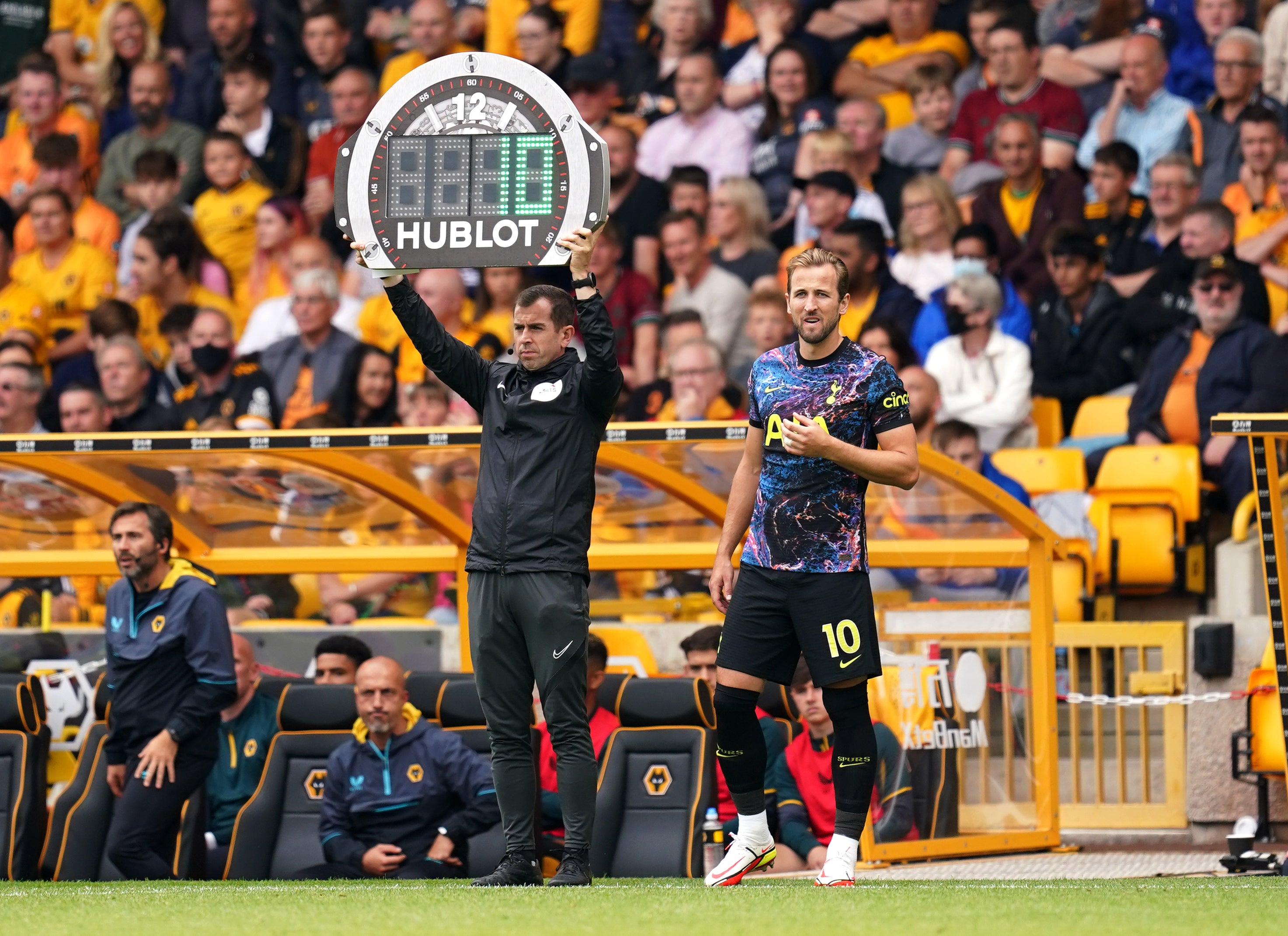 Harry Kane prepares to come on as a second-half substitute for Tottenham at Wolves.