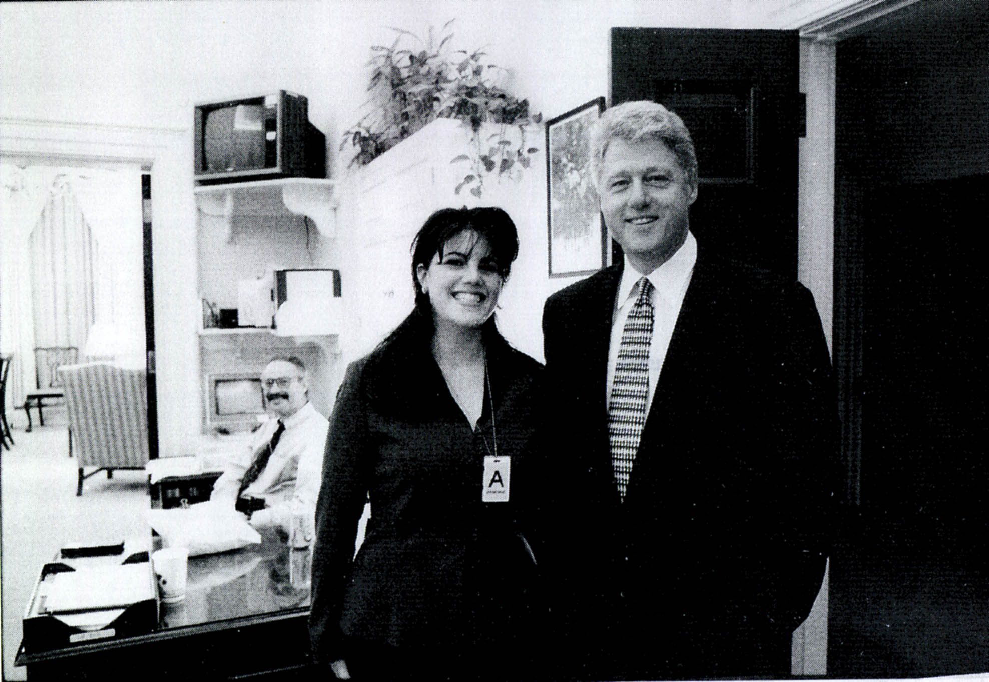 A photograph showing former White House intern Monica Lewinsky meeting President Bill Clinton at a White House function submitted as evidence in documents by the Starr investigation and released by the House Judiciary committee on 21 September 1998