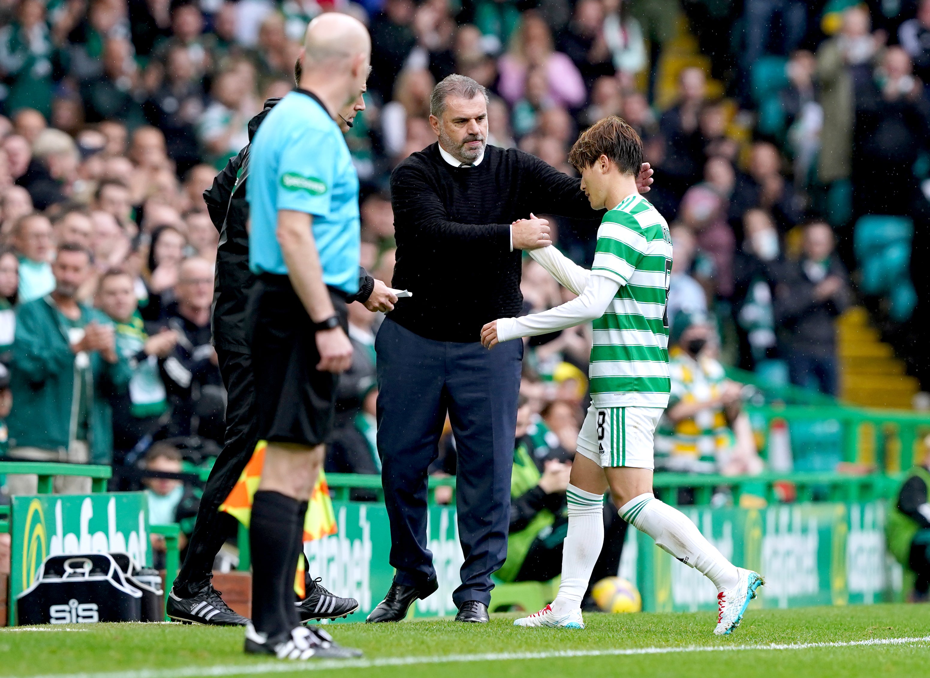 Ange Postecoglou and Kyogo Furuhashi (Andrew Milligan/PA)