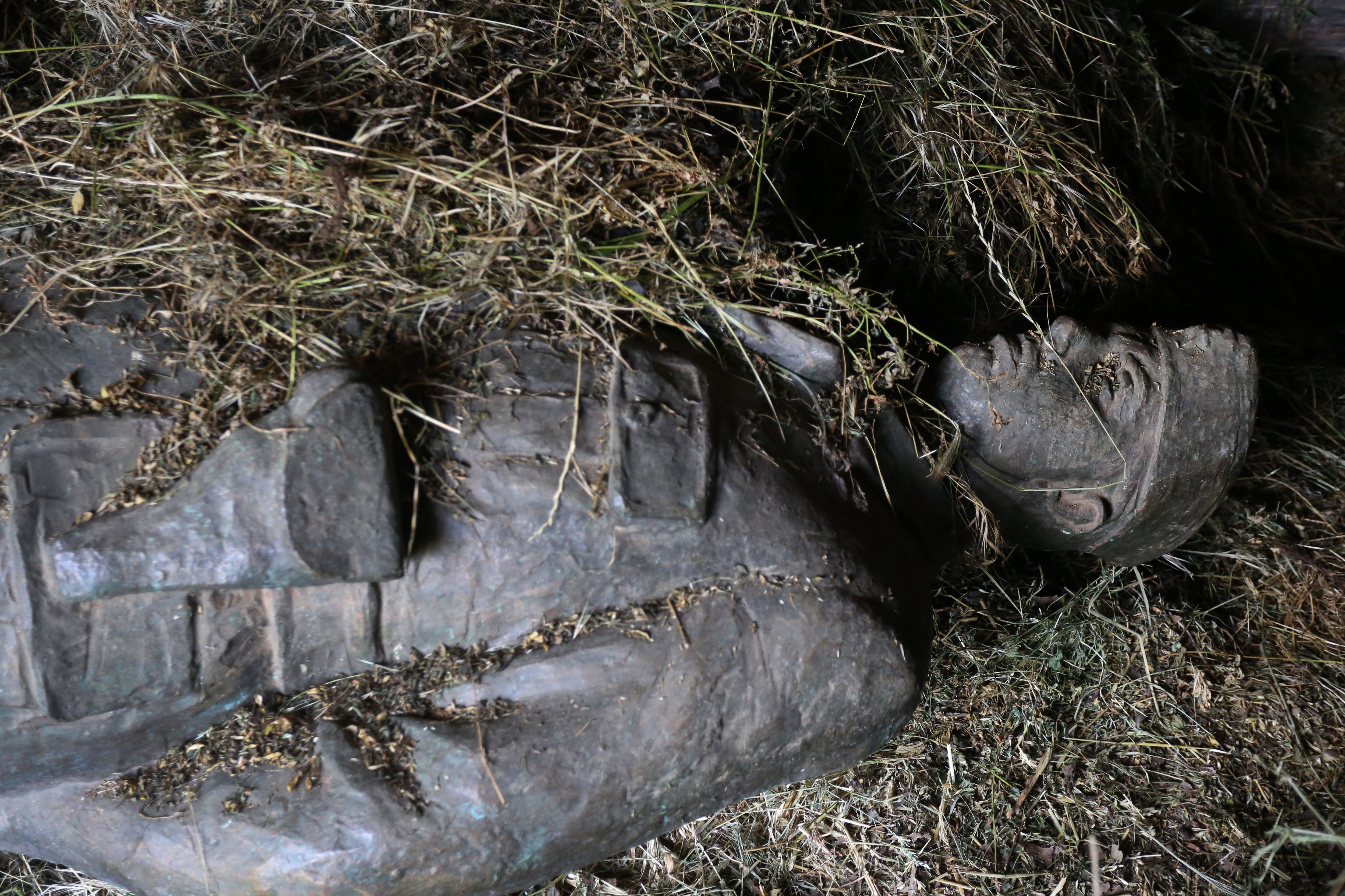 The bronze effigy of the late communist dictator Enver Hoxha is hidden in the basement of an Albanian museum that was destroyed after 1991