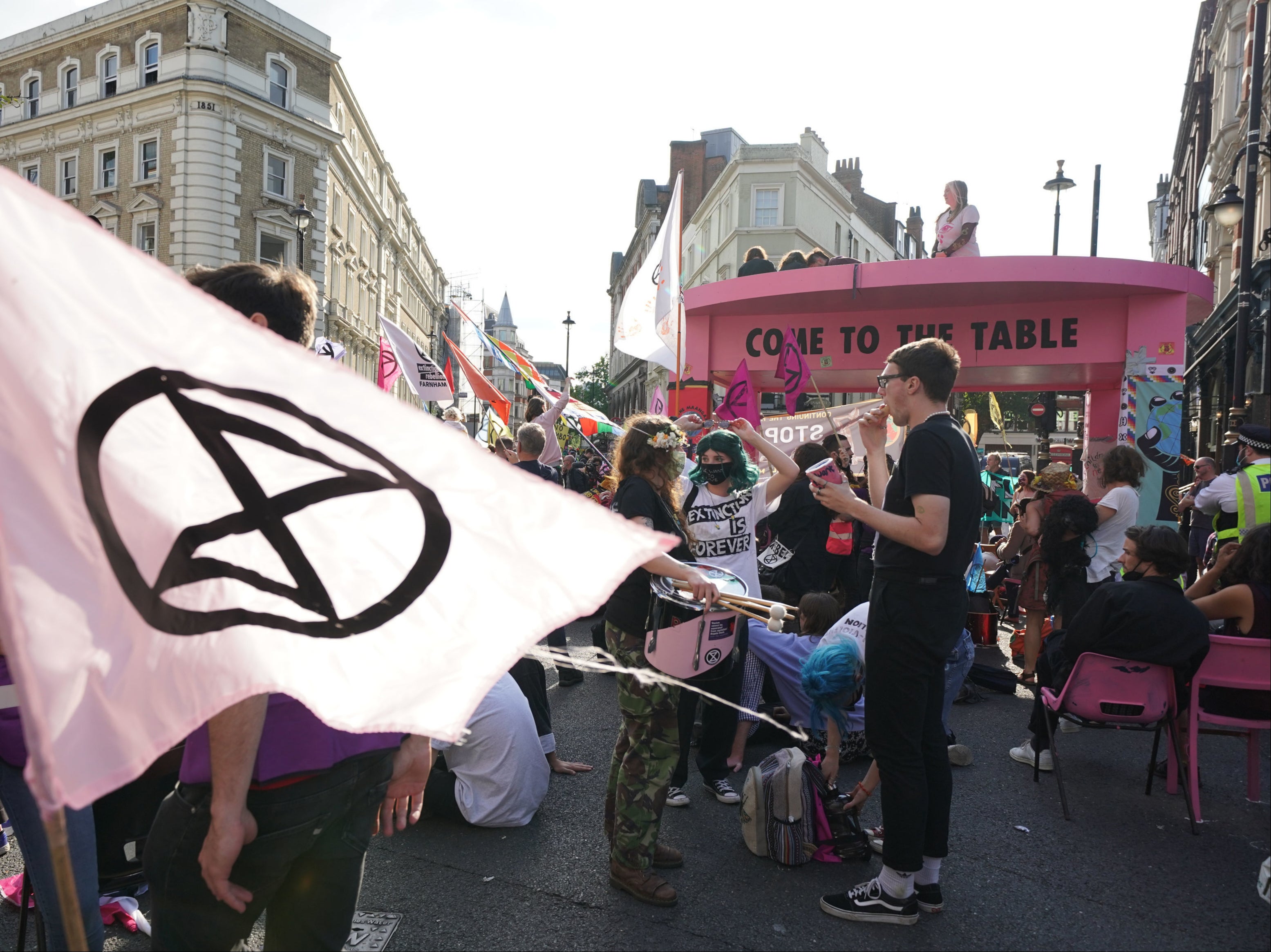 XR protesters block the junction of Long Acre and Upper St Martin’s Lane on 23 August