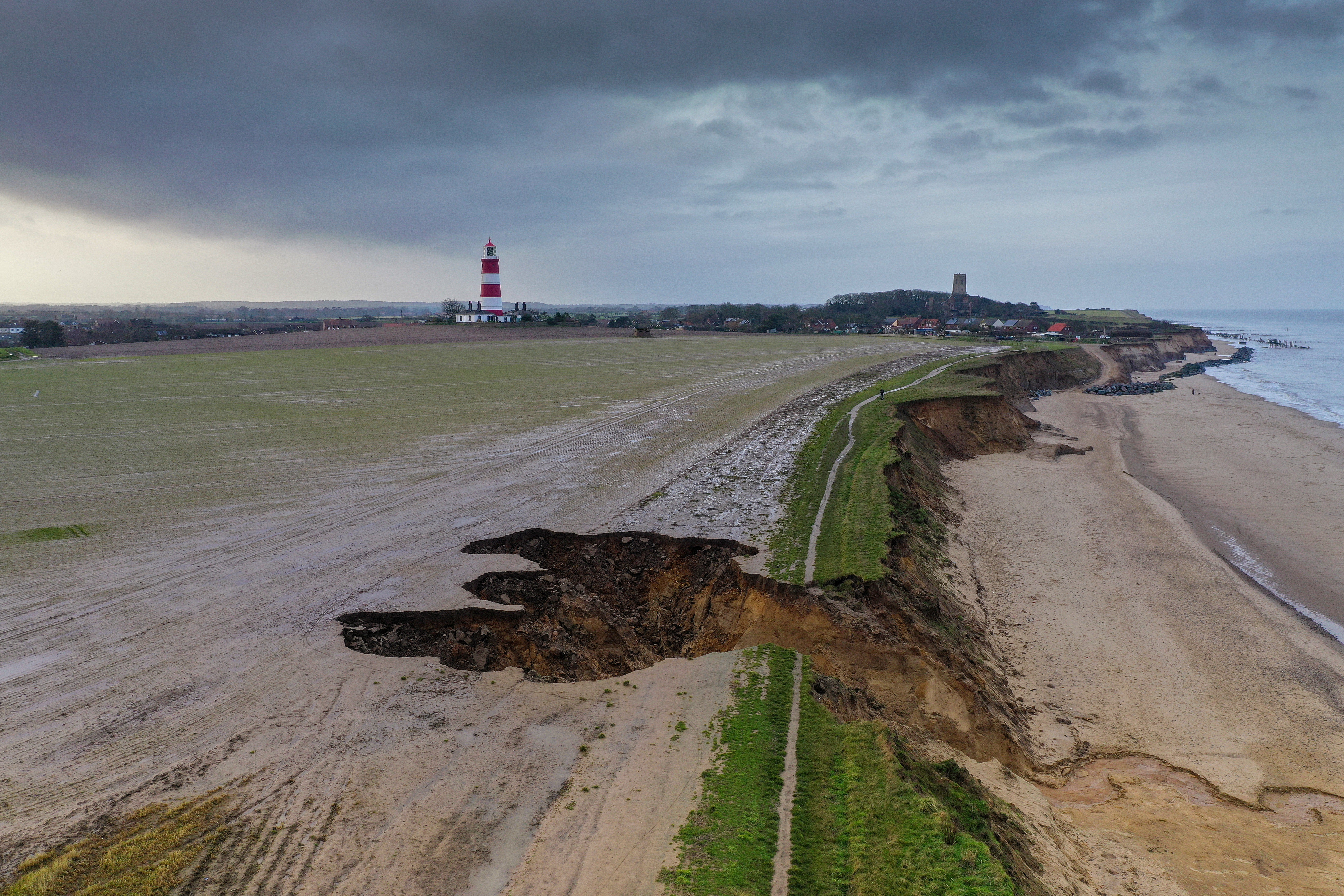 A landslip on Happisburgh’s cliff edge and beach in January this year