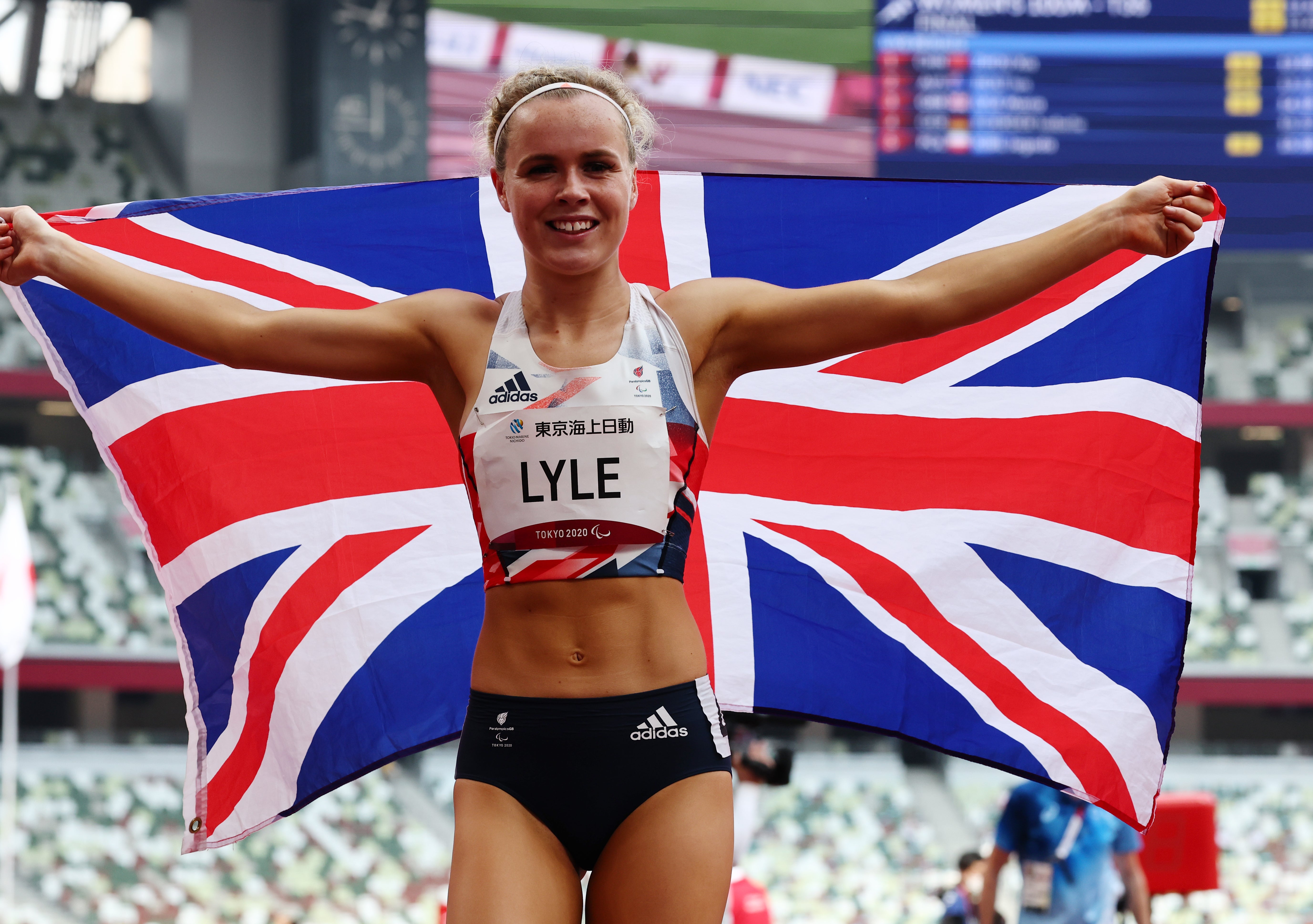 Britain’s Maria Lyle celebrates winning bronze in the women's T35 100m