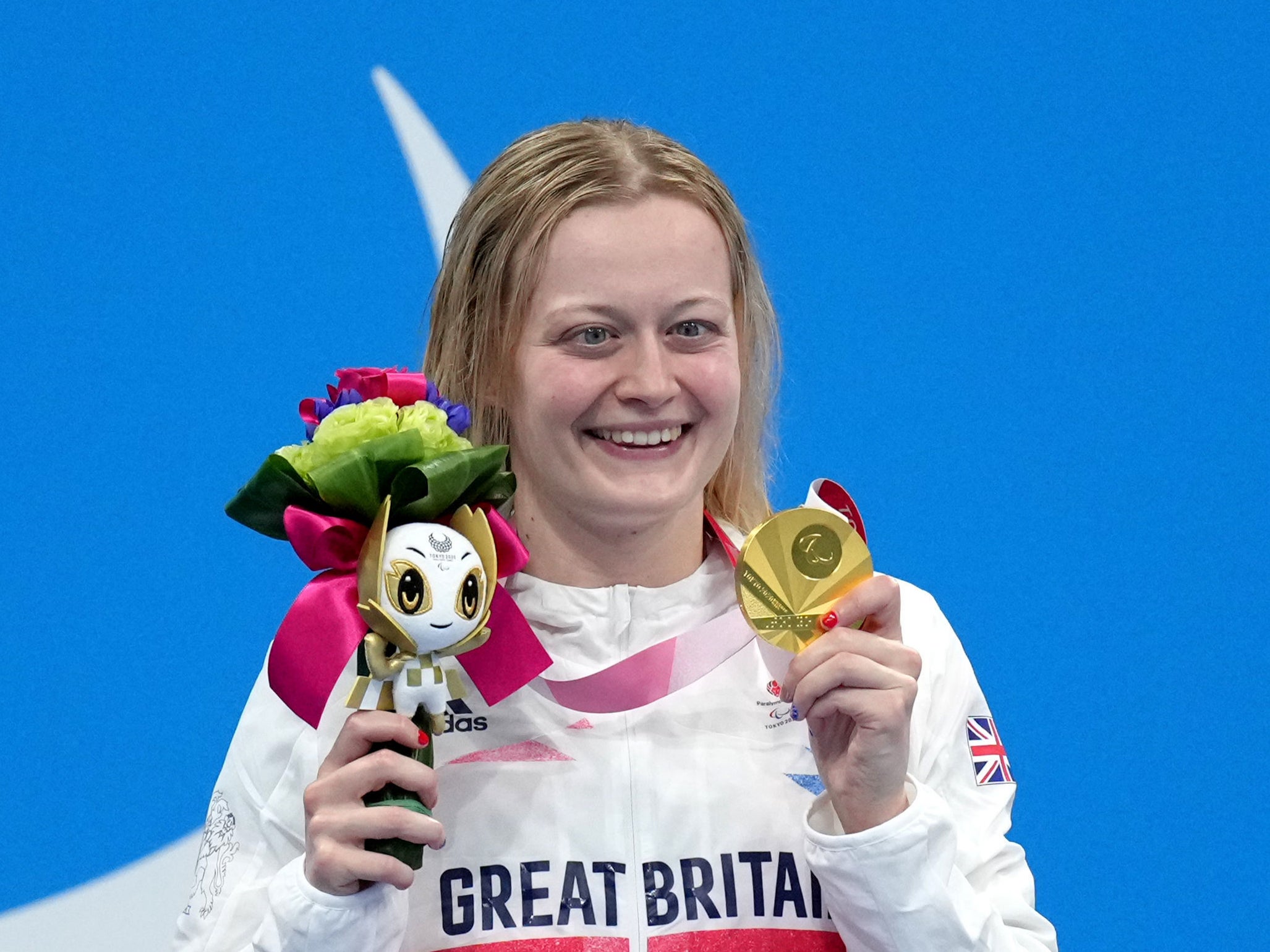 Hannah Russell celebrates after retaining her S12 100m backstroke title