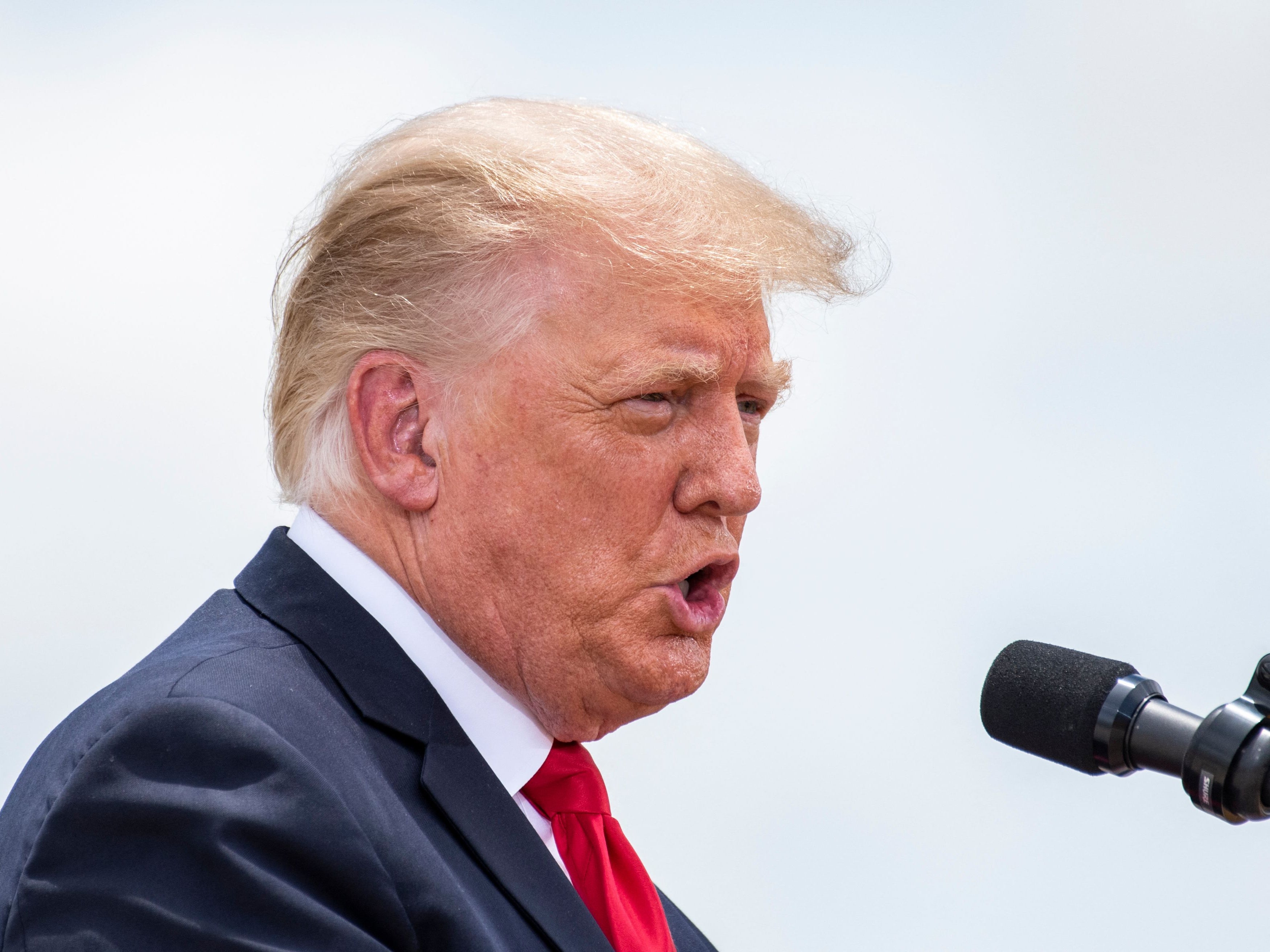 File: Former US President Donald Trump speaks during a visit to the border wall near Pharr, Texas