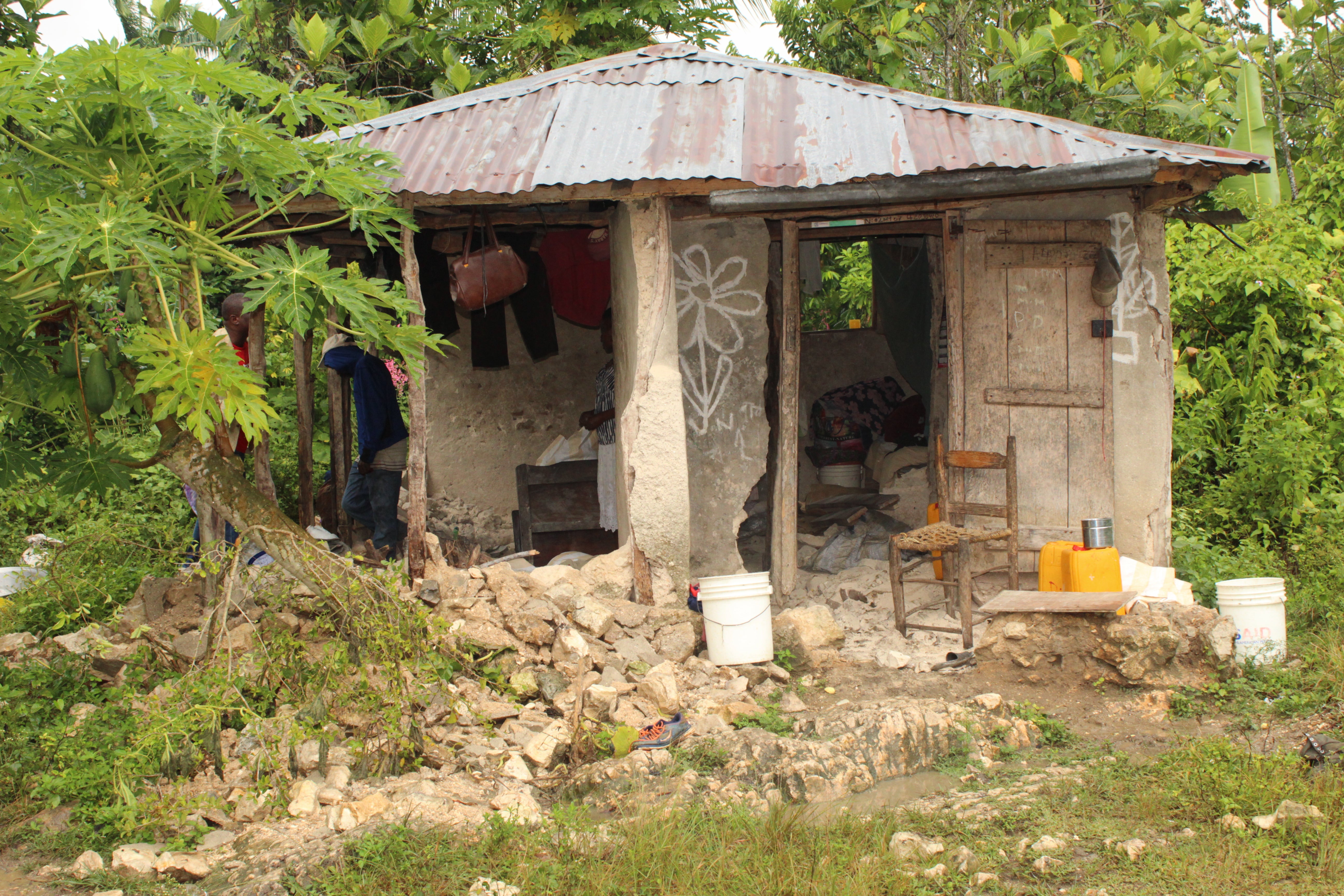 Marie, her husband and four children are sleeping in the courtyard of their home after it was destroyed in the earthquake