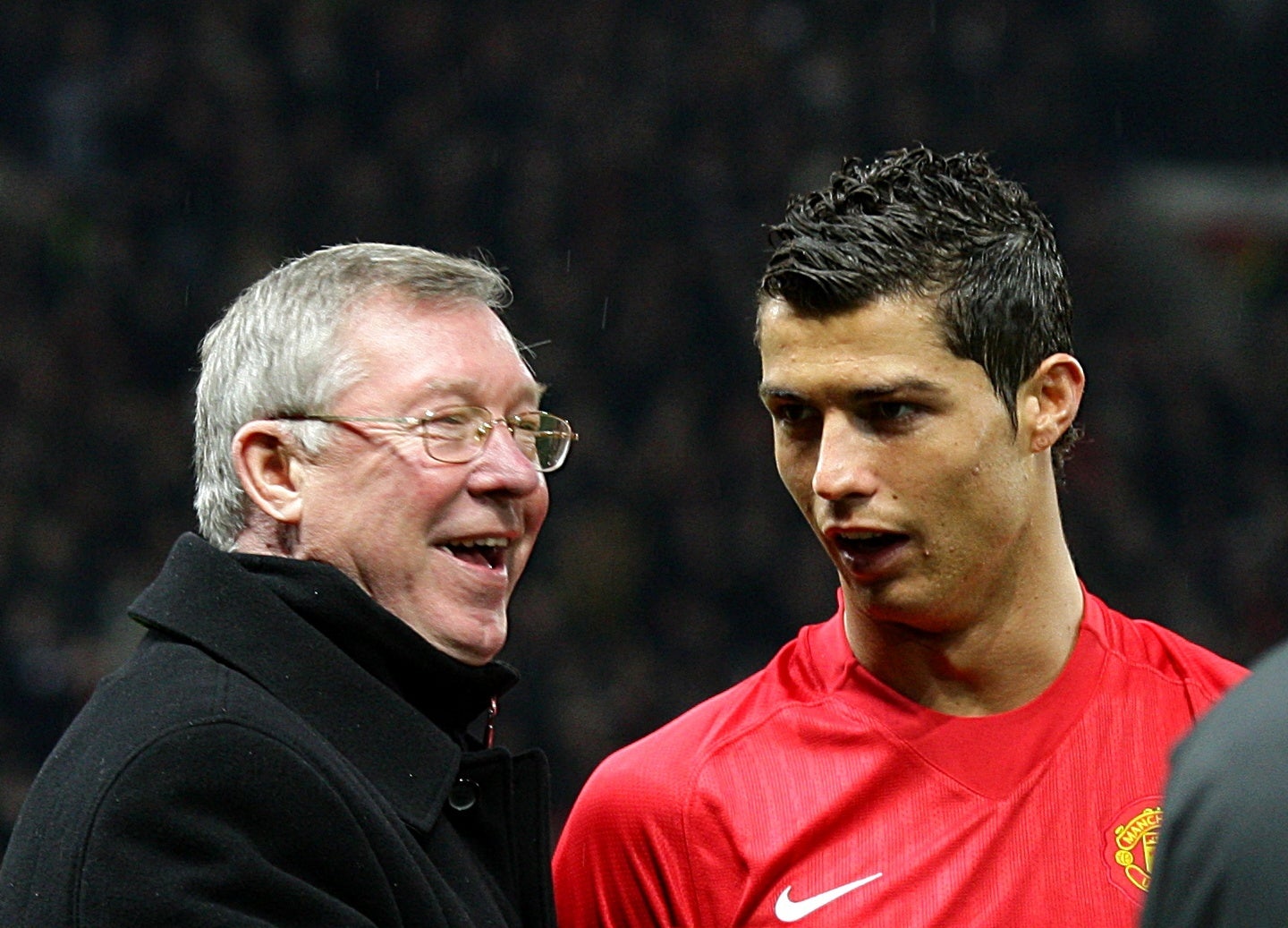 Sir Alex Ferguson, left, spoke to Cristiano Ronaldo about a return to Old Trafford (Martin Rickett/PA)