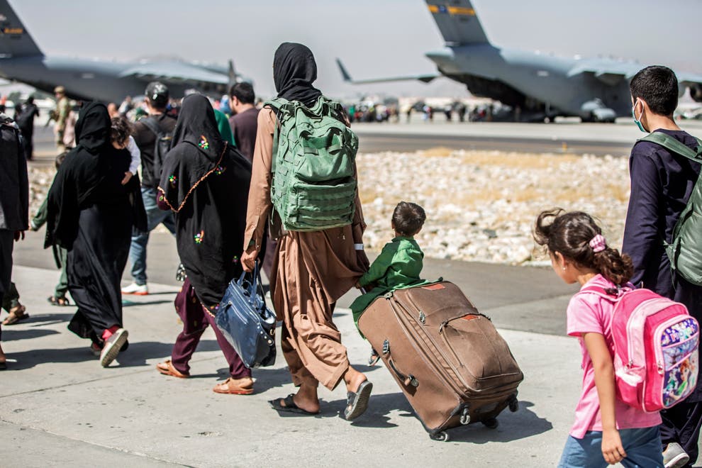 Afghans escaping the Taliban at Kabul Airport