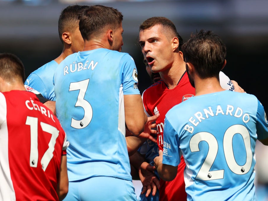 Granit Xhaka argues with Ruben Dias after being sent off