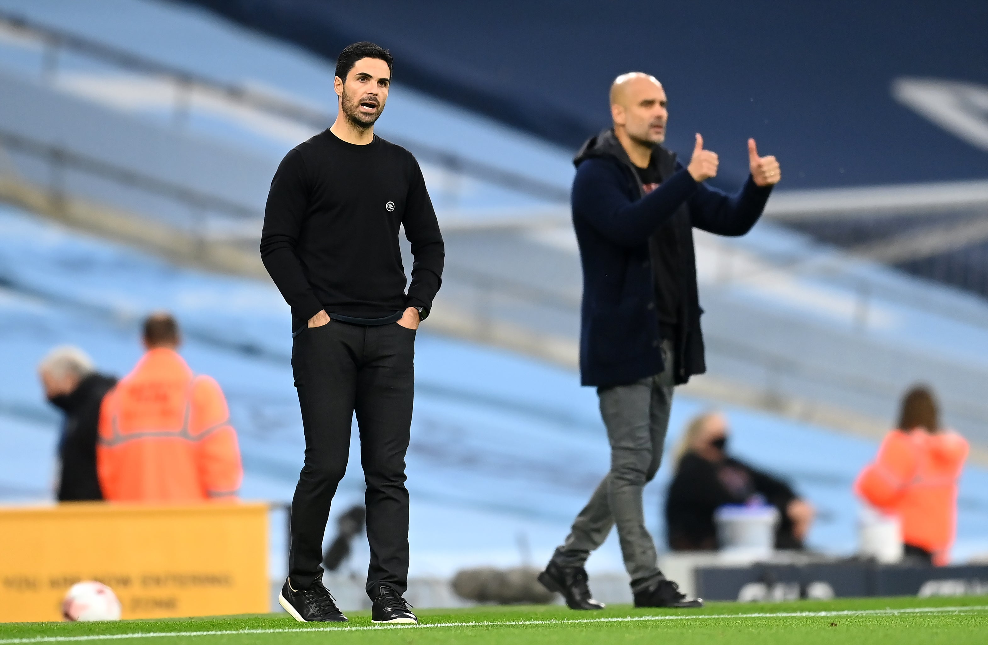 Mikel Arteta (left) and Pep Guardiola (Michael Regan/PA)