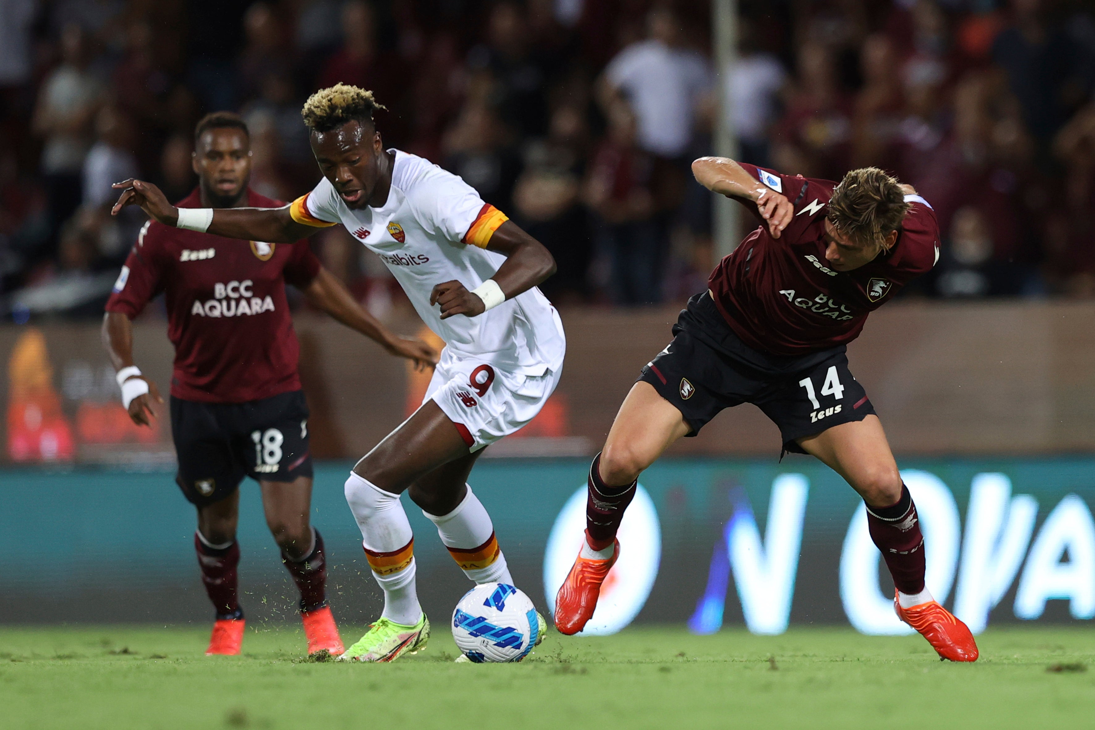 Tammy Abraham, left, and Salernitana’s Francesco Di Tacchio battle for the ball (Alessandro Garofalo/LaPresse via AP)