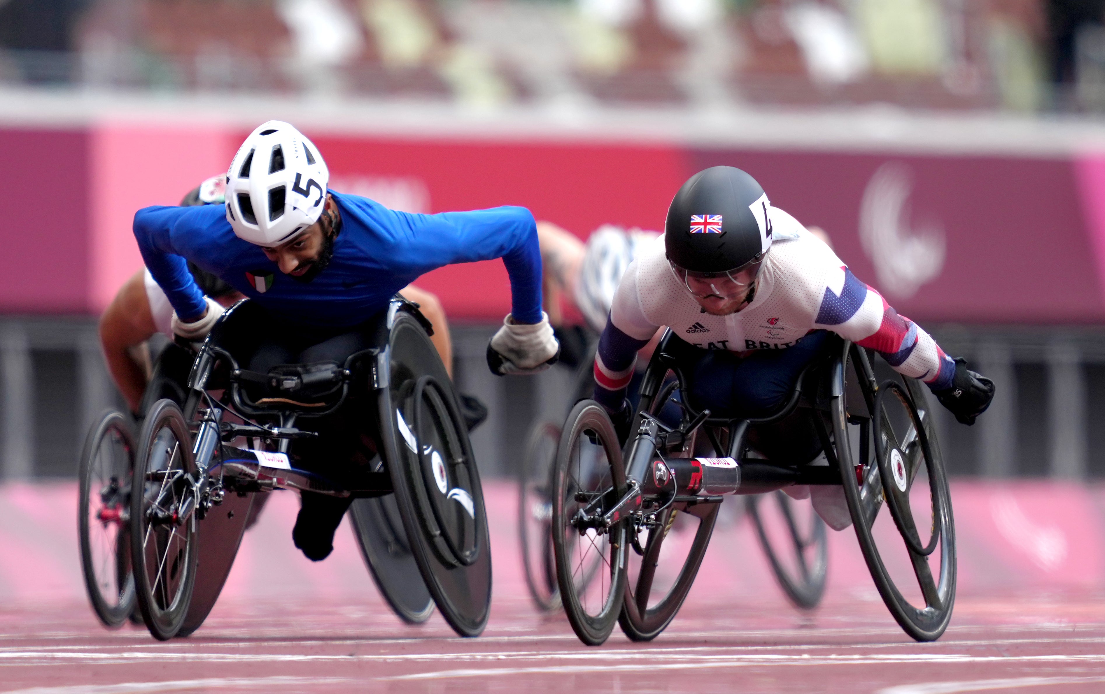 Great Britain’s Andrew Small (right) on his way to winning the men’s 100 metres – T33 Final on day six of the Tokyo 2020 Paralympic Games (John Walton/PA)