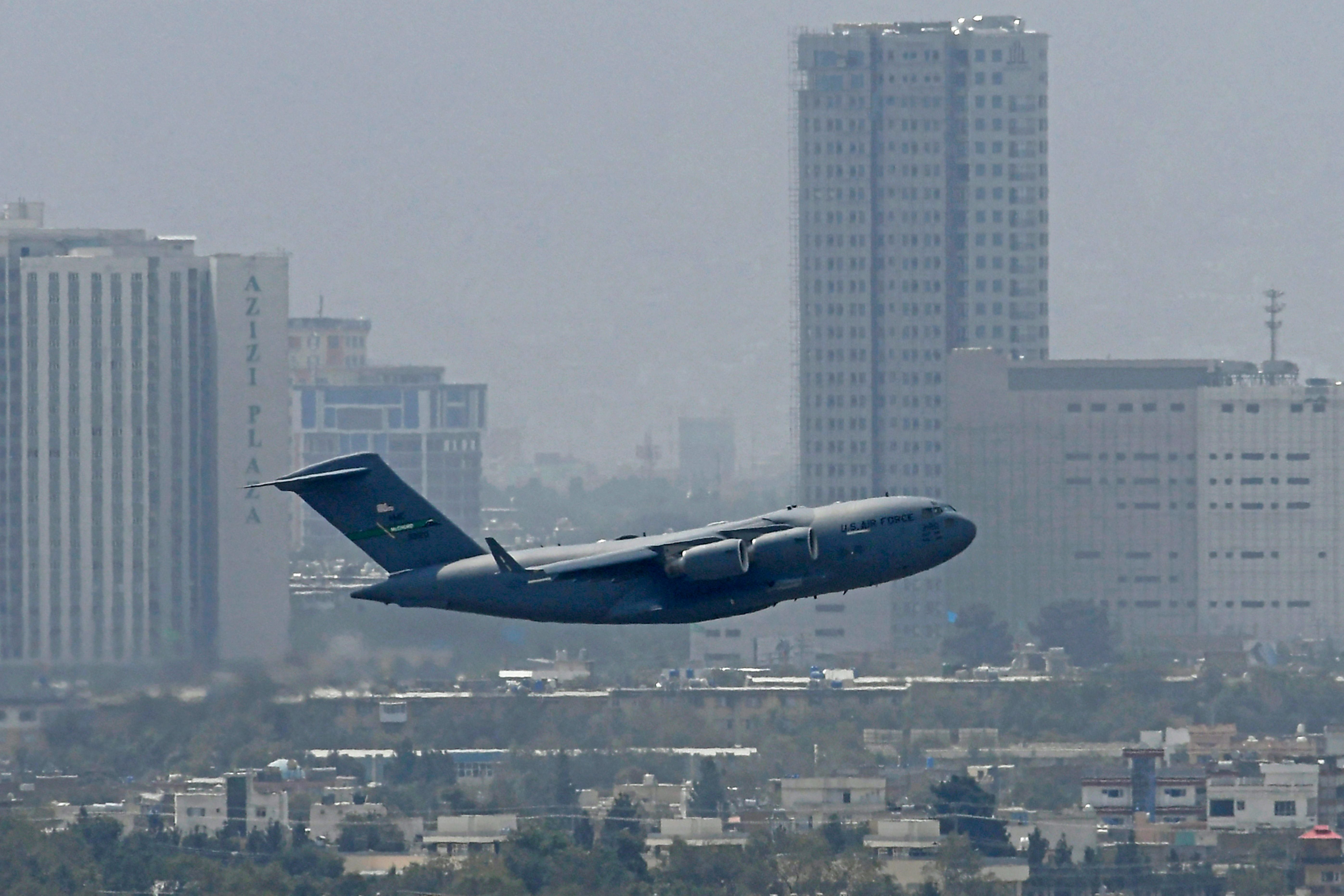 An US Air Force aircraft takes off from the airport in Kabul on August 30, 2021.