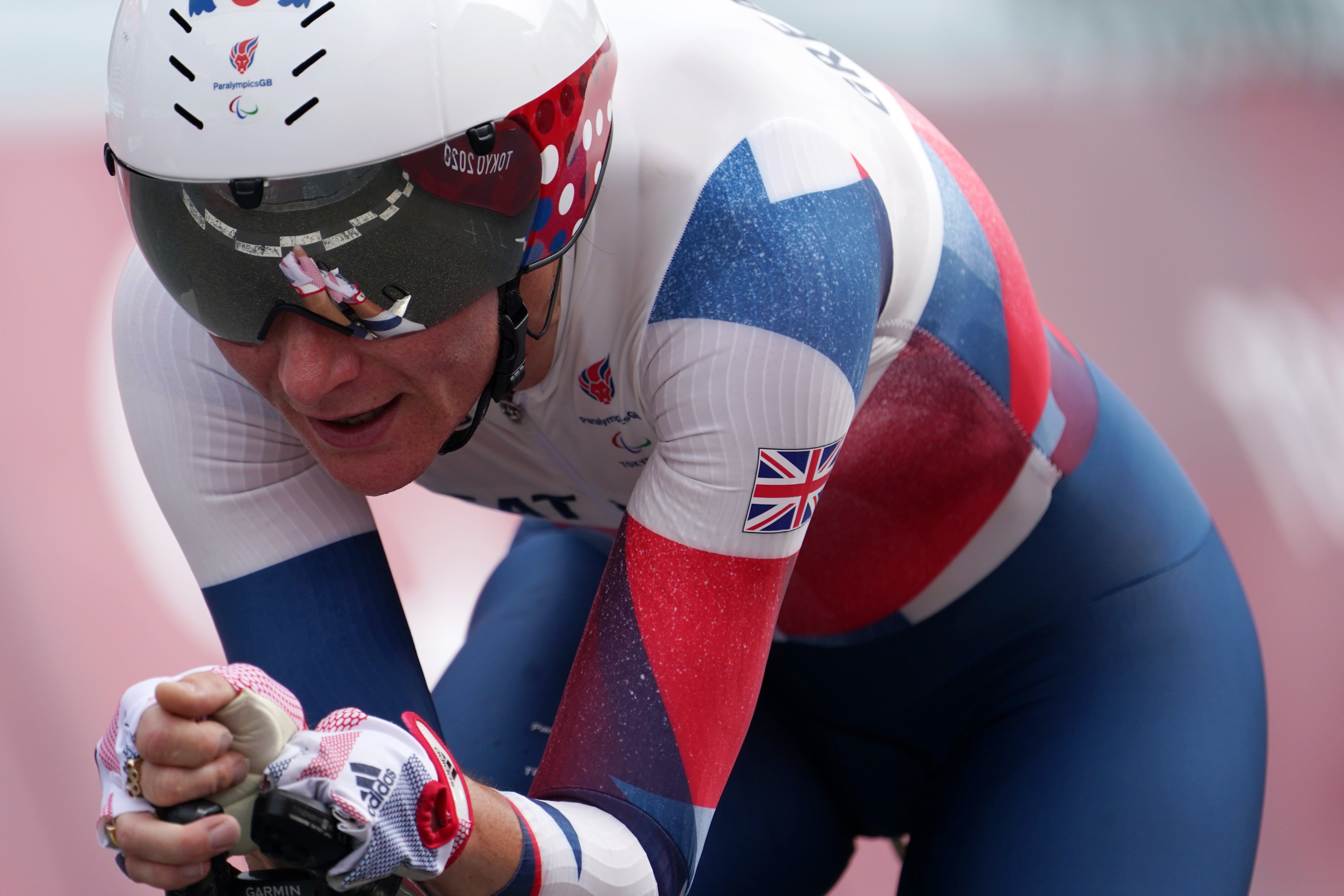 arah Storey of Team Great Britain crosses the finish line to win the gold medal in the Cycling Road Women's C5 Time Trial on day 7 of the Tokyo 2020 Paralympic Games