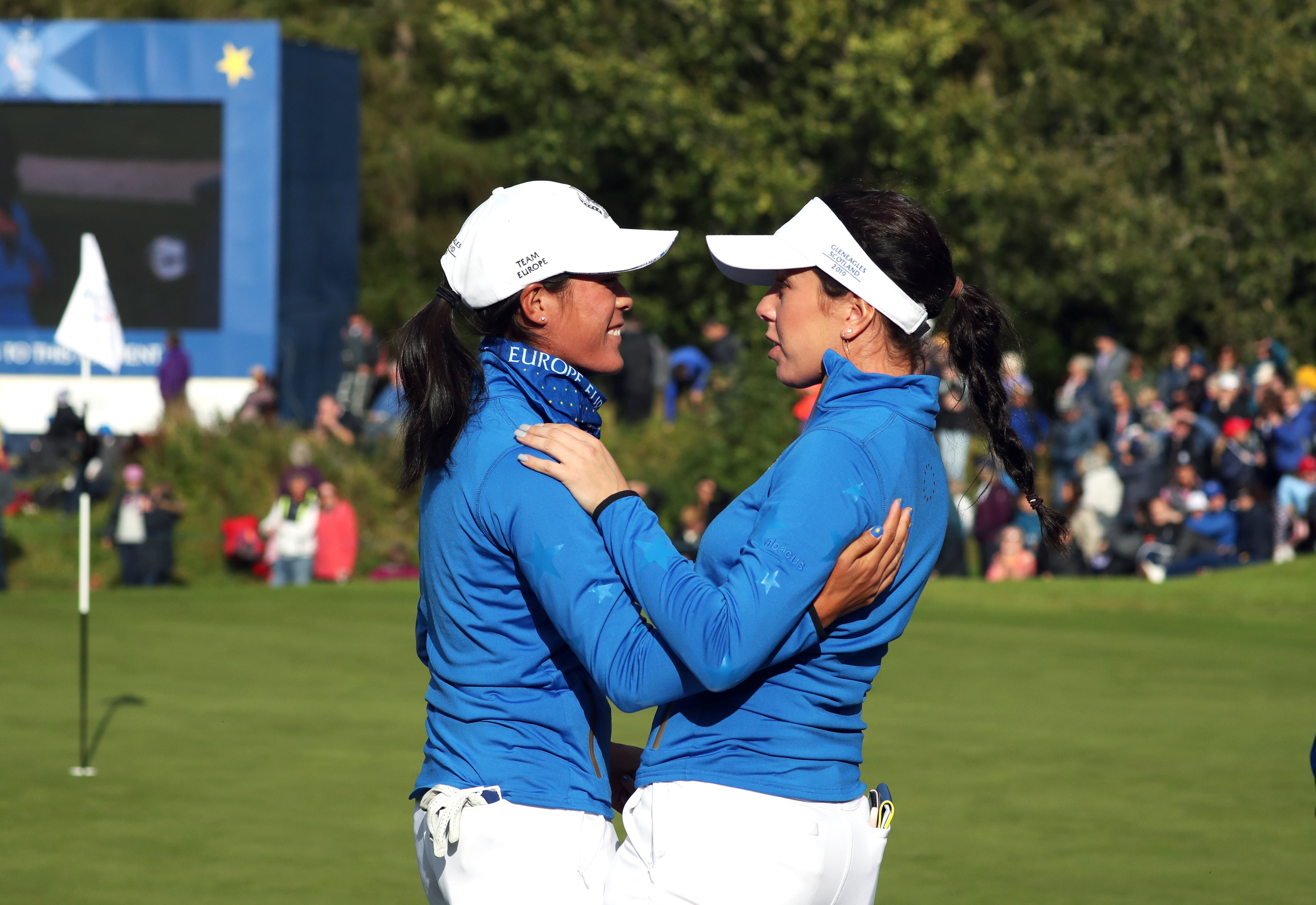 Team Europe’s Georgia Hall (right) celebrates with Celine Boutier after winning on day three of the 2019 Solheim Cup at Gleneagles (Jane Barlow/PA)