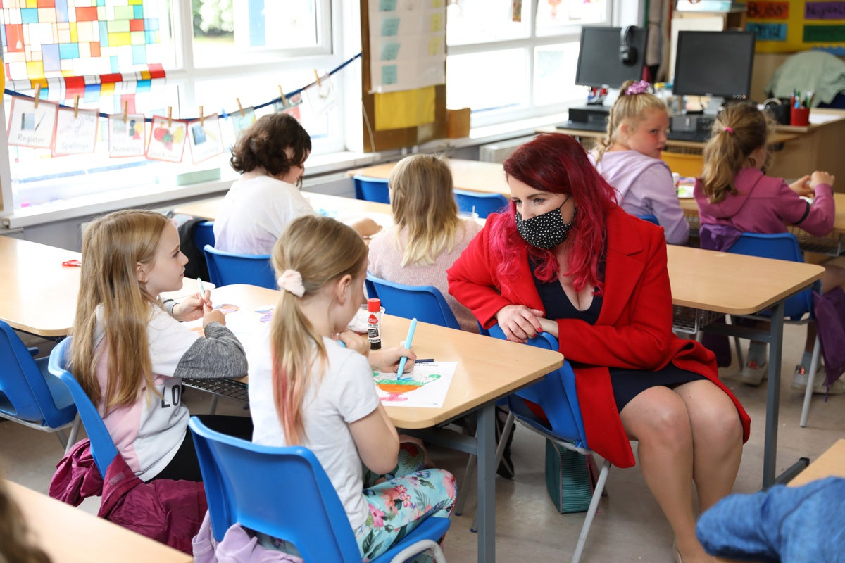 Shadow secretary Louise Haigh talks with P4 children during a visit to Forge Integrated Primary School in Belfast