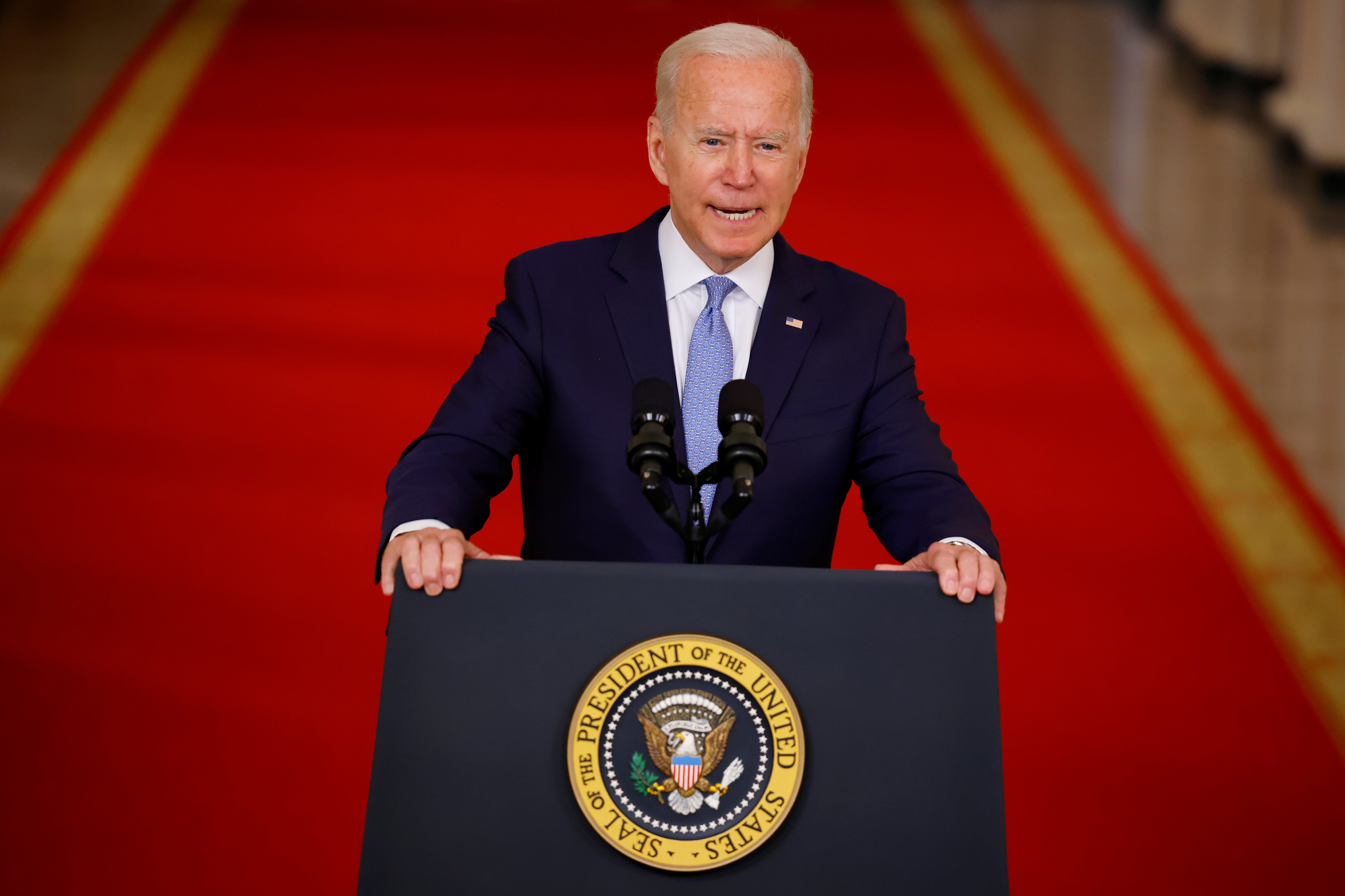 US President Joe Biden delivers remarks on Afghanistan during a speech in the State Dining Room at the White House