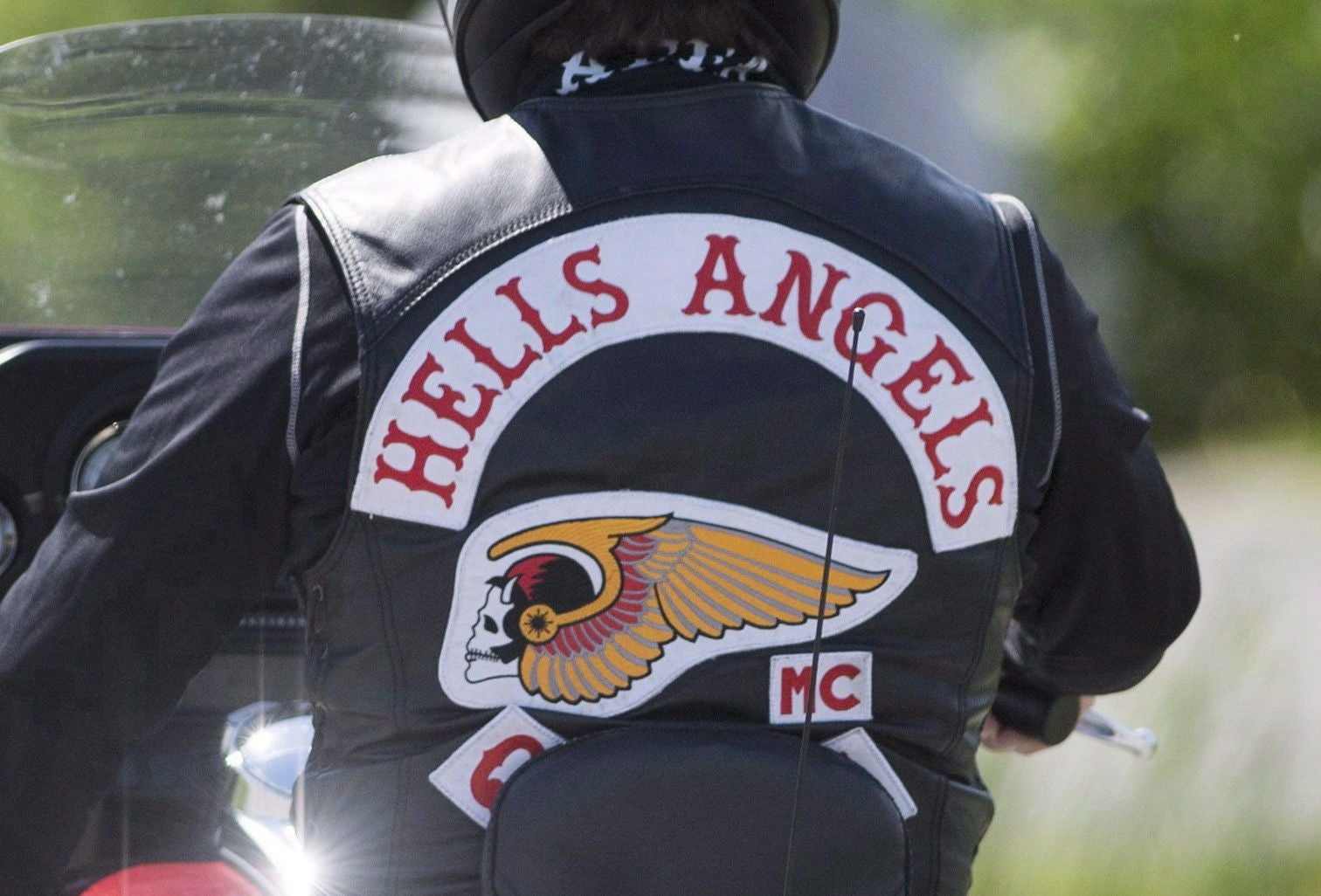 A member of the Hells Angels arrives for a national gathering in Saint-Charles-sur-Richelieu, Que., on August 10, 2018.