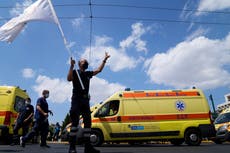 Greek health care workers protest compulsory vaccinations