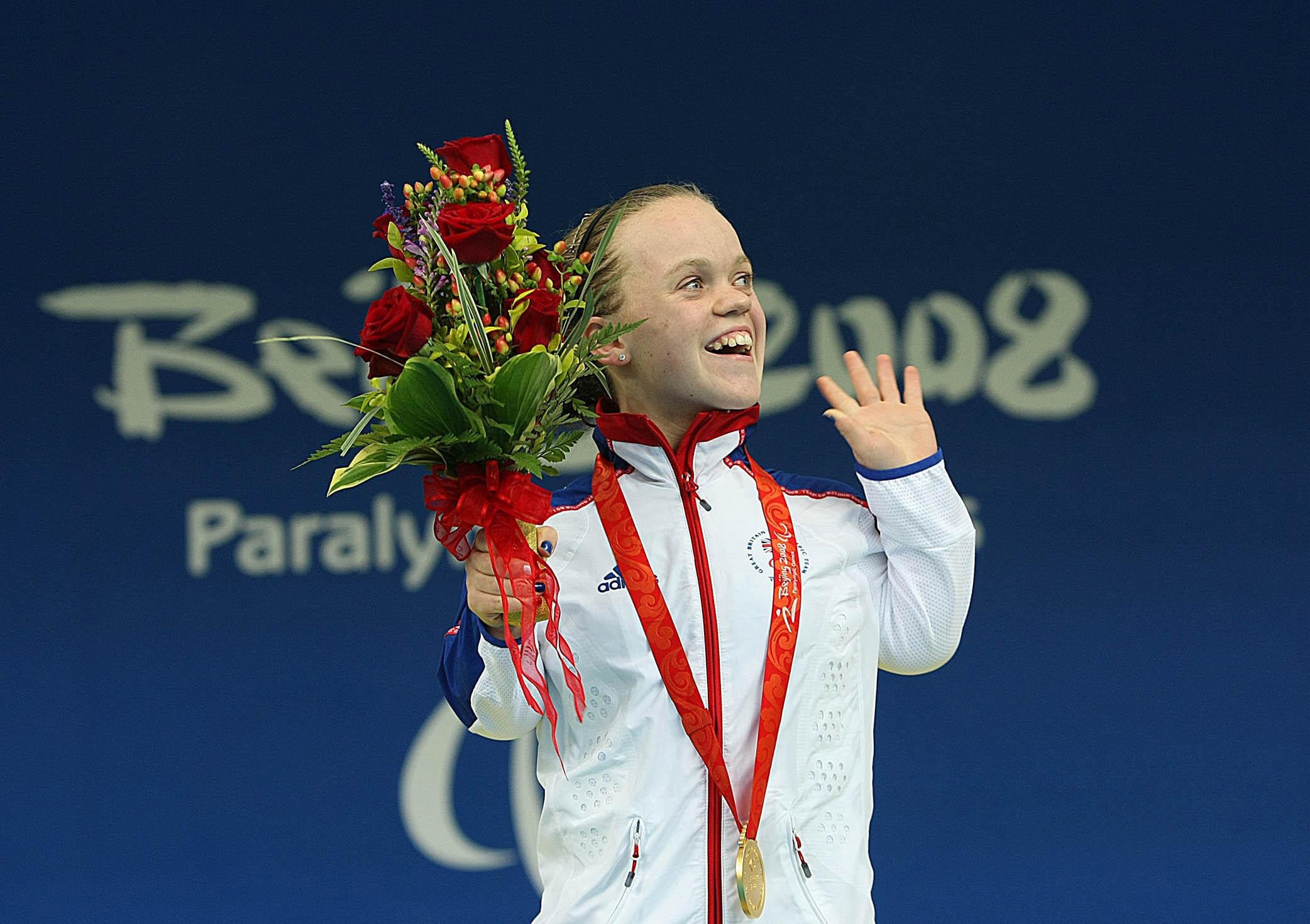 Ellie Simmonds celebrates with her 400m freestyle gold medal in Beijing (Julien Behal/PA)