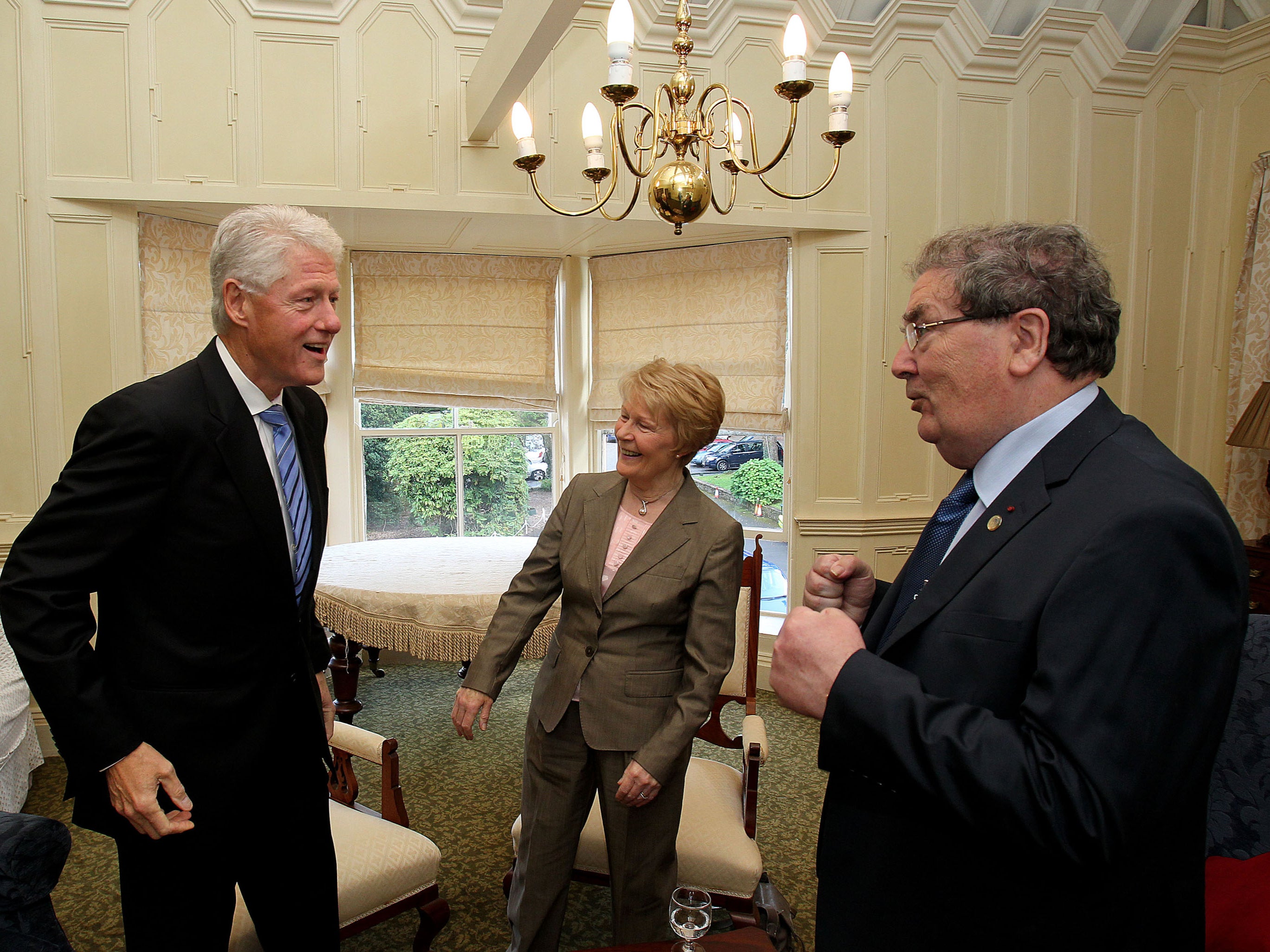 Pat and John Hume meet former US president Bill Clinton in Derry in 2010