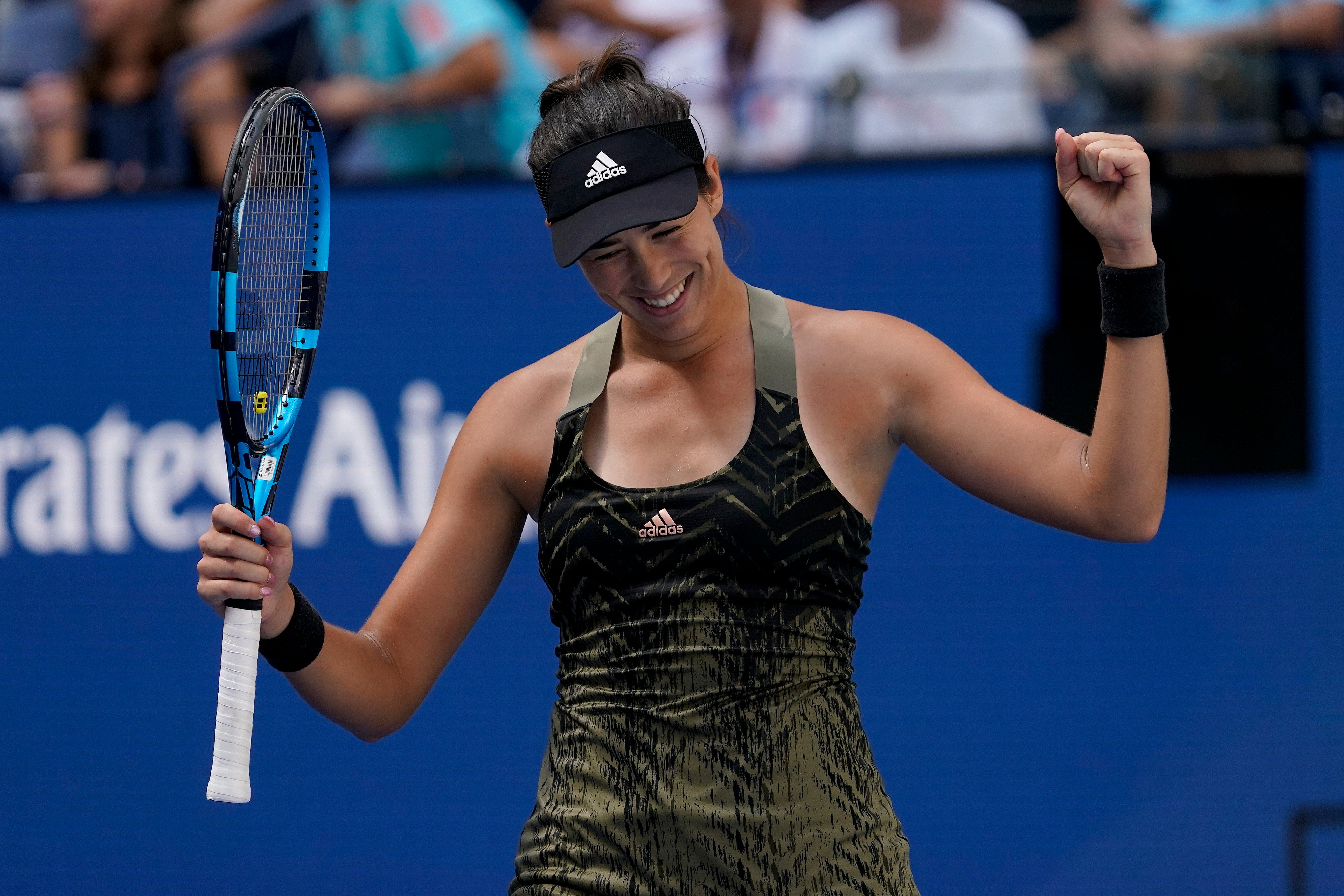 Garbine Muguruza celebrates beating Victoria Azarenka (Seth Wenig/AP)