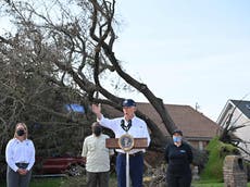 Biden comforts Louisiana as police make door-to-door searches after flooding death toll rises in northeast