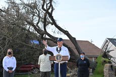Biden comforts Louisiana as police make door-to-door searches after flooding death toll rises in northeast