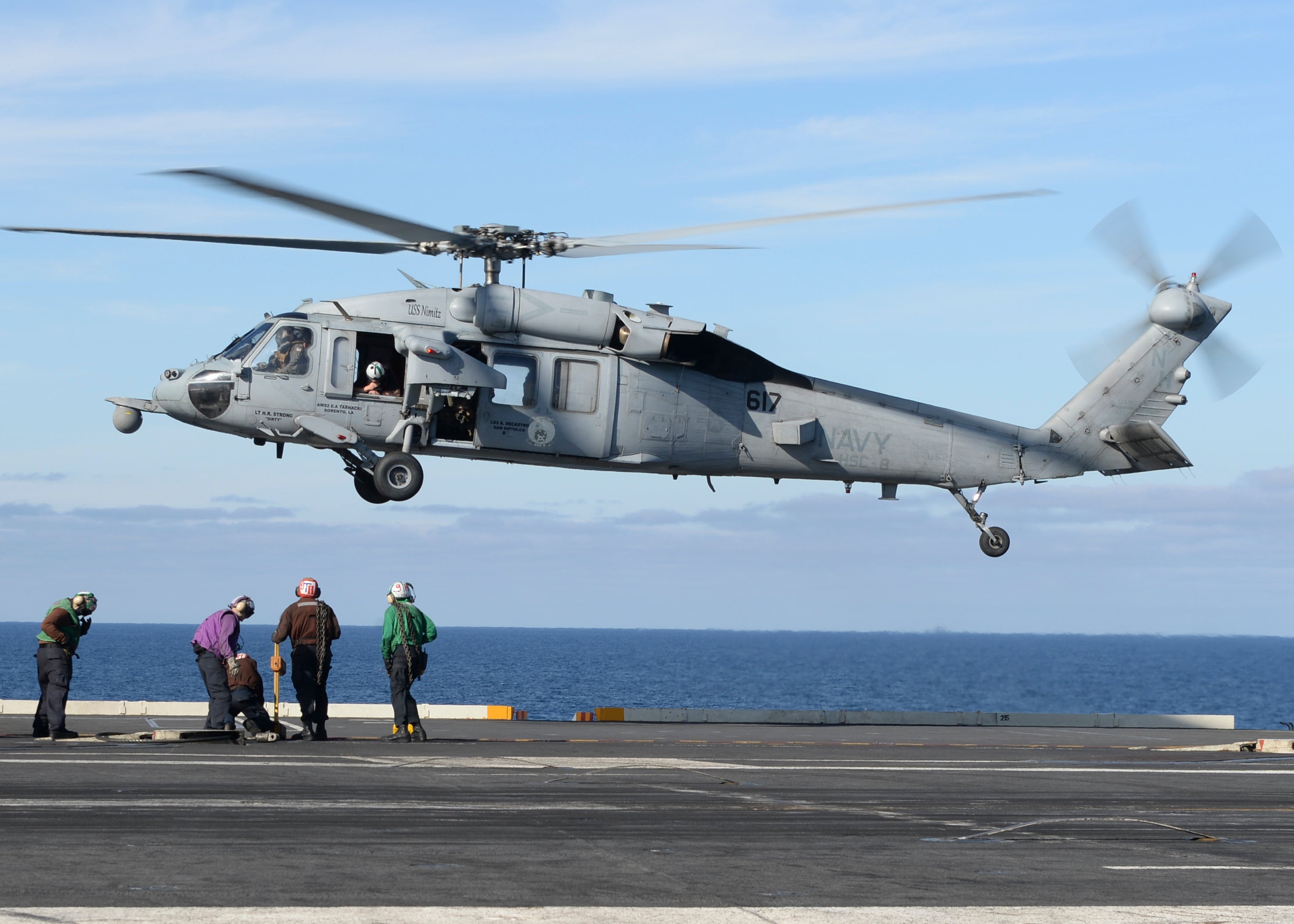 A file photo of an MH-60S Seak Hawk helicopter operating off the deck of an aircraft carrier