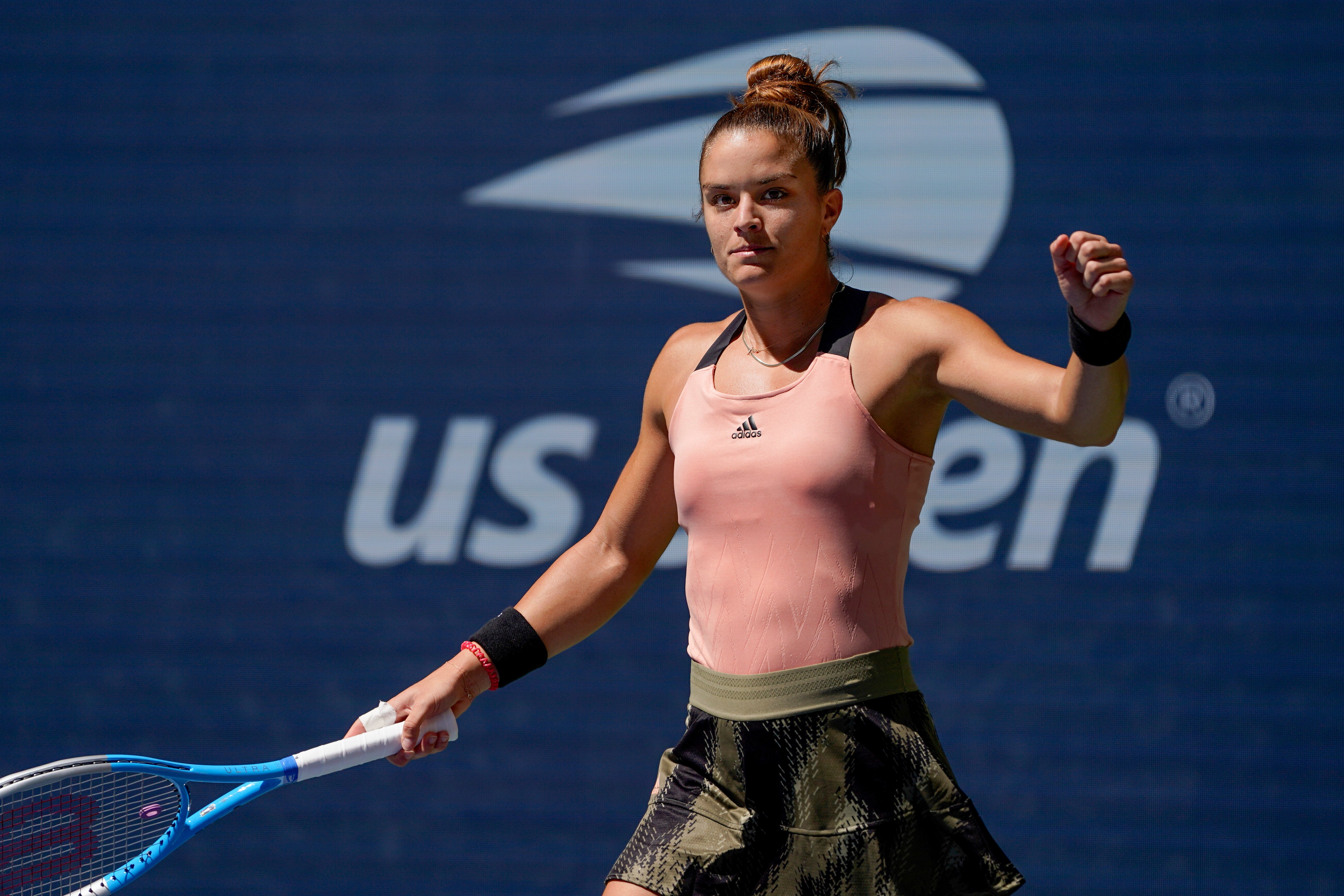 Maria Sakkari celebrates defeating Petra Kvitova (John Minchillo/AP)