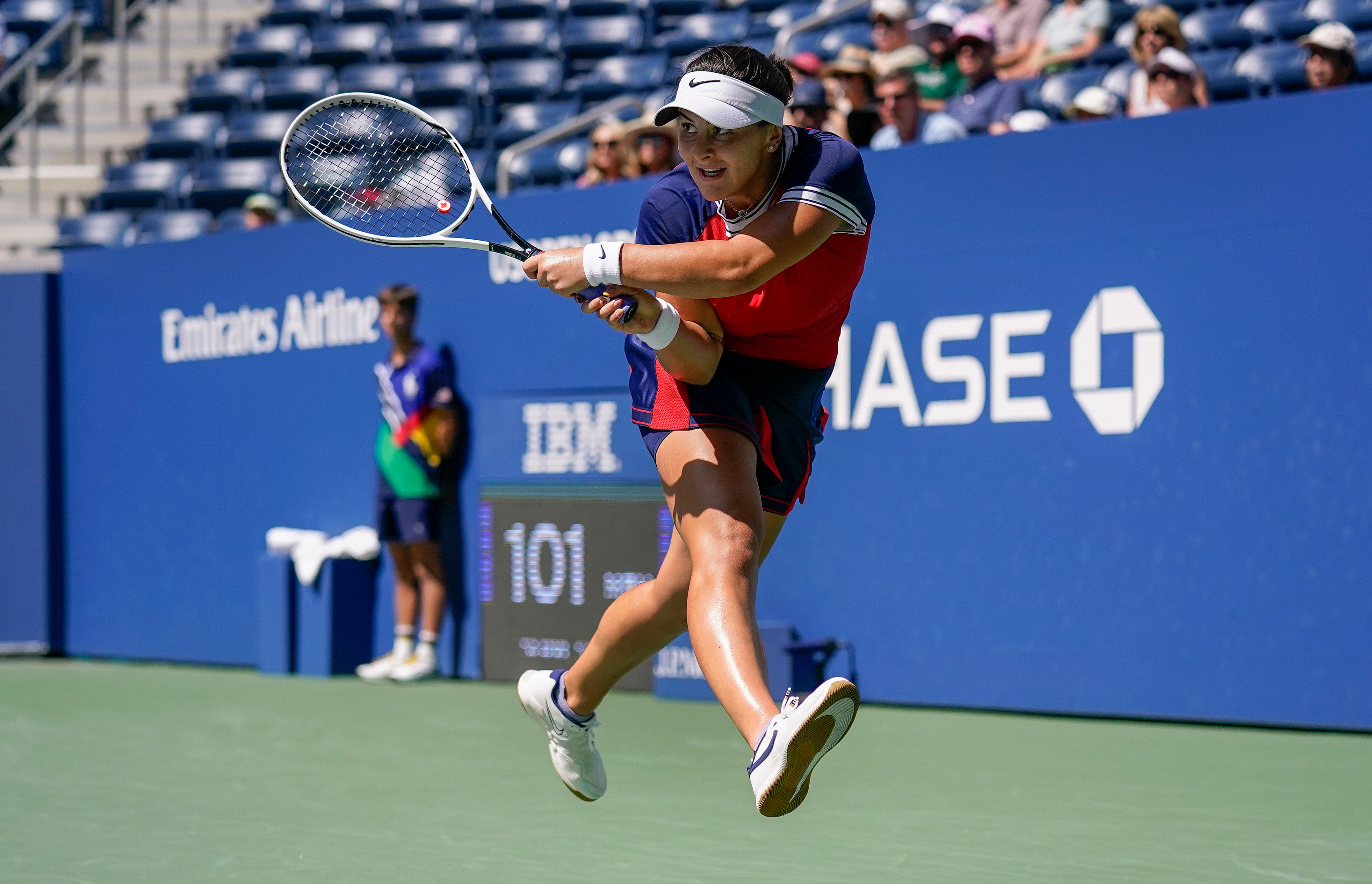 Bianca Andreescu hits a running backhand during her victory over Greet Minnen (Seth Wenig/AP)