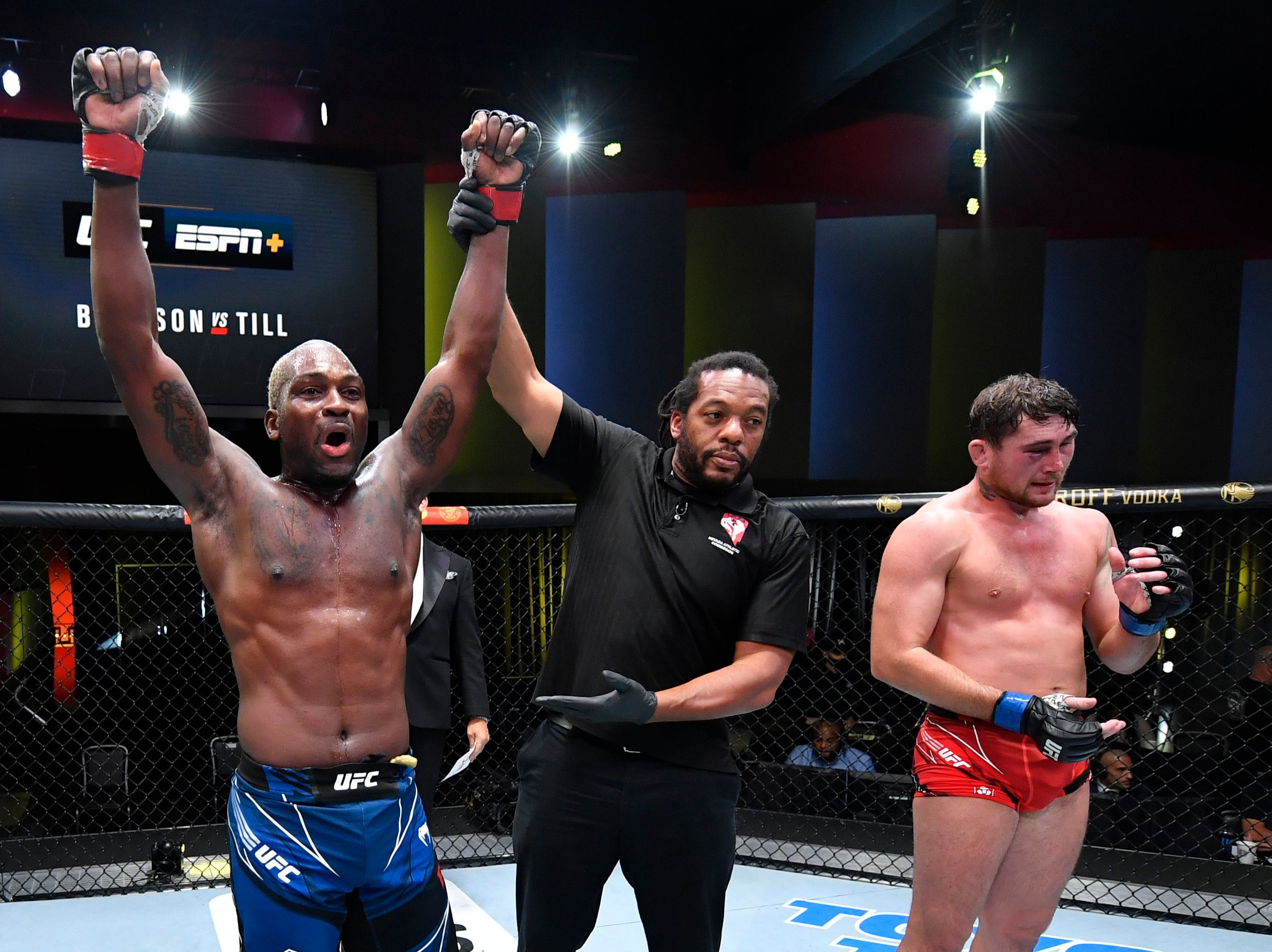 Derek Brunson celebrates after beating Darren Till via submission