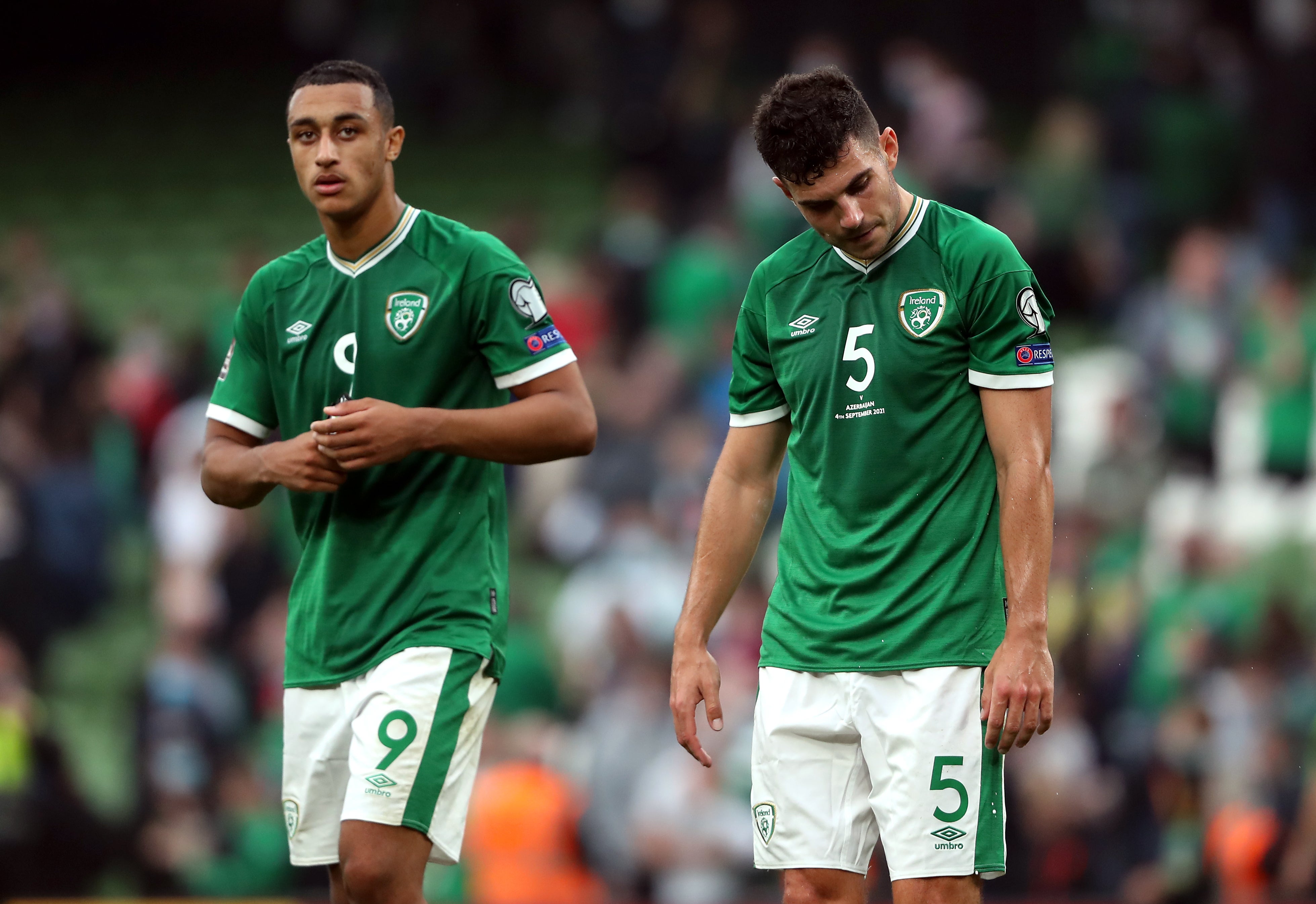 Republic of Ireland’s John Egan and Adam Idah, left, appear dejected after the World Cup qualifier draw with Azerbaijan (Niall Carson/PA)