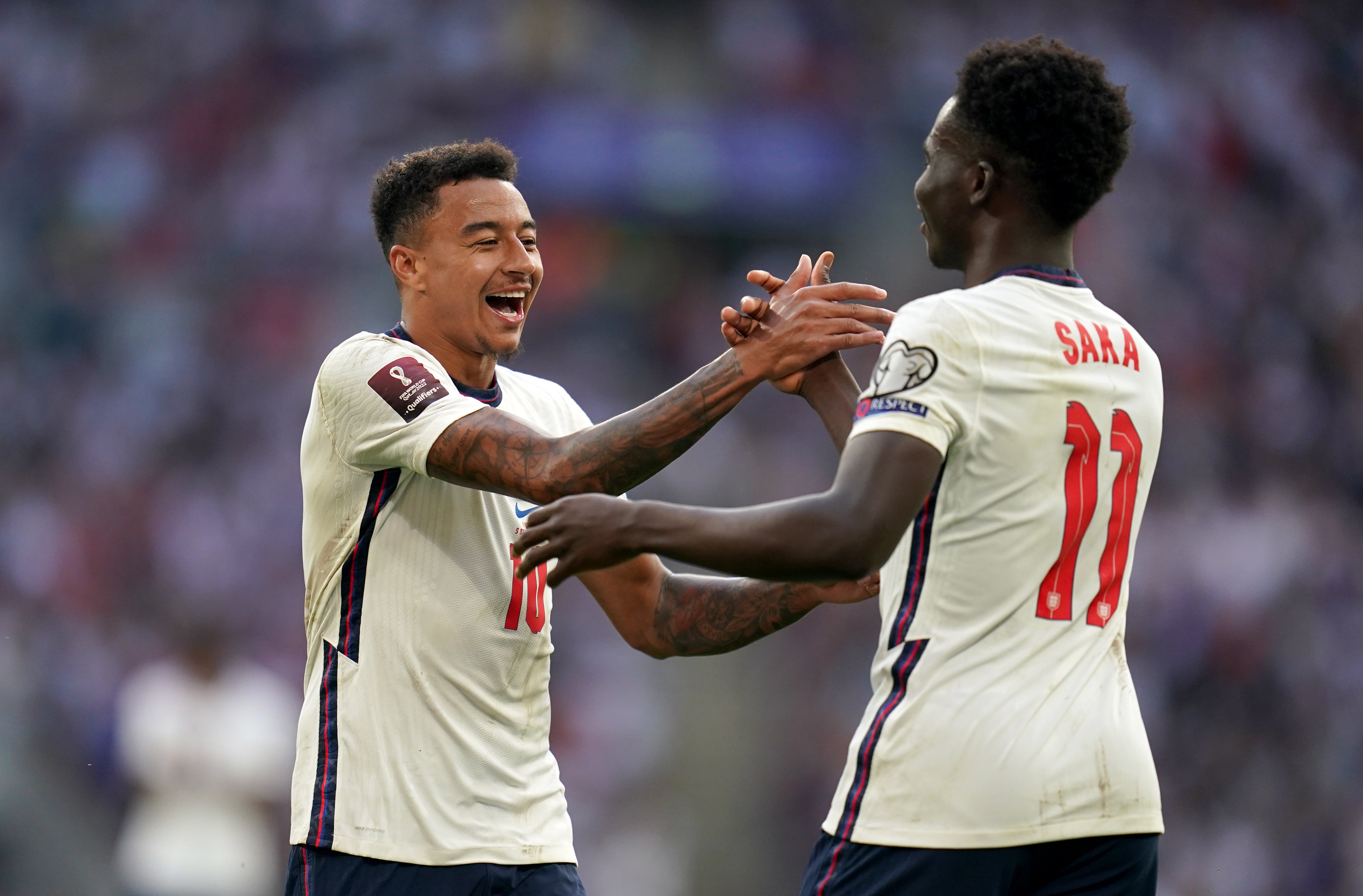 Jesse Lingard (left) celebrates with Bukayo Saka (Nick Potts/PA)