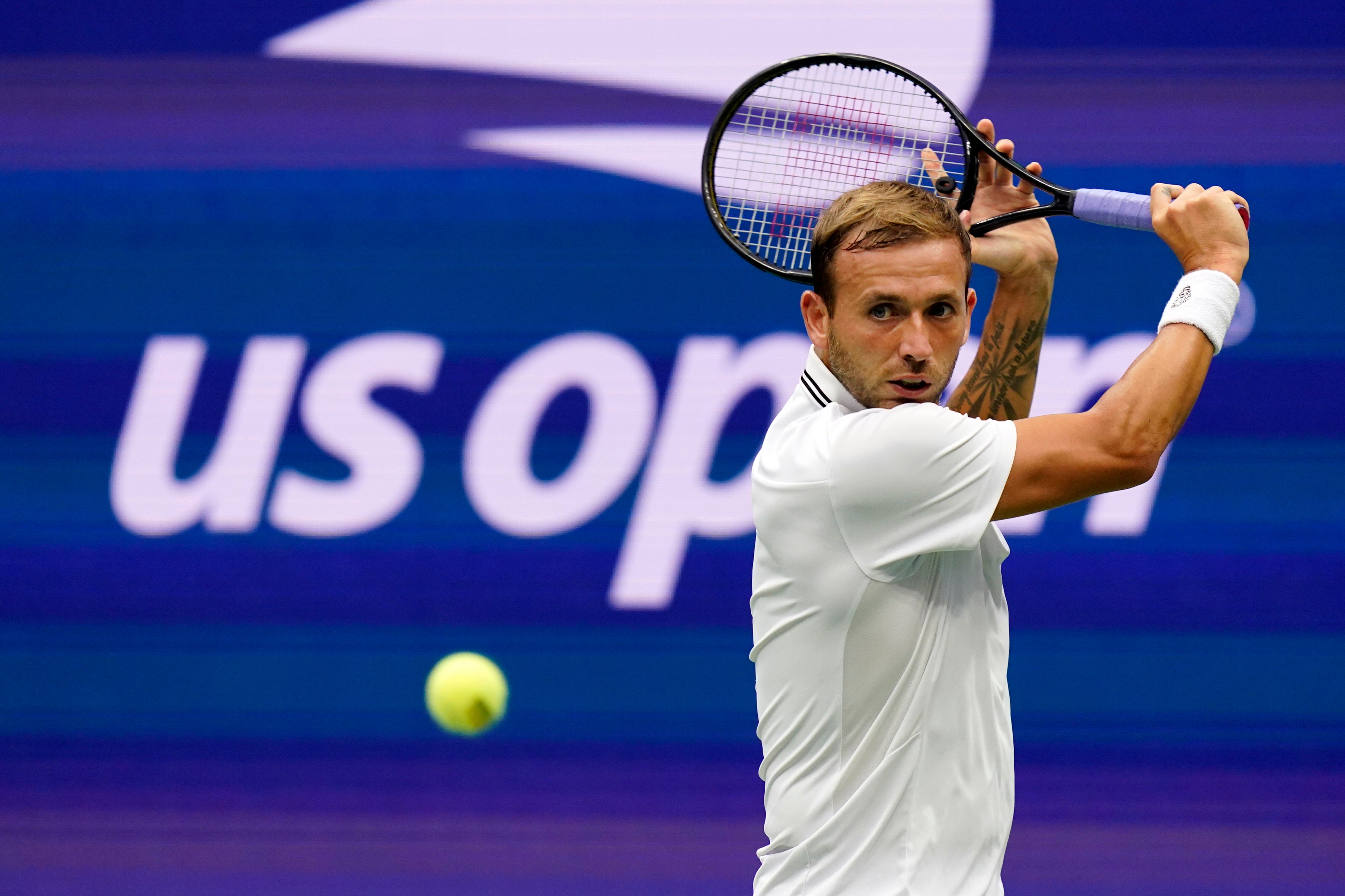 Dan Evans lost in straight sets to Daniil Medvedev (Seth Wenig/AP)