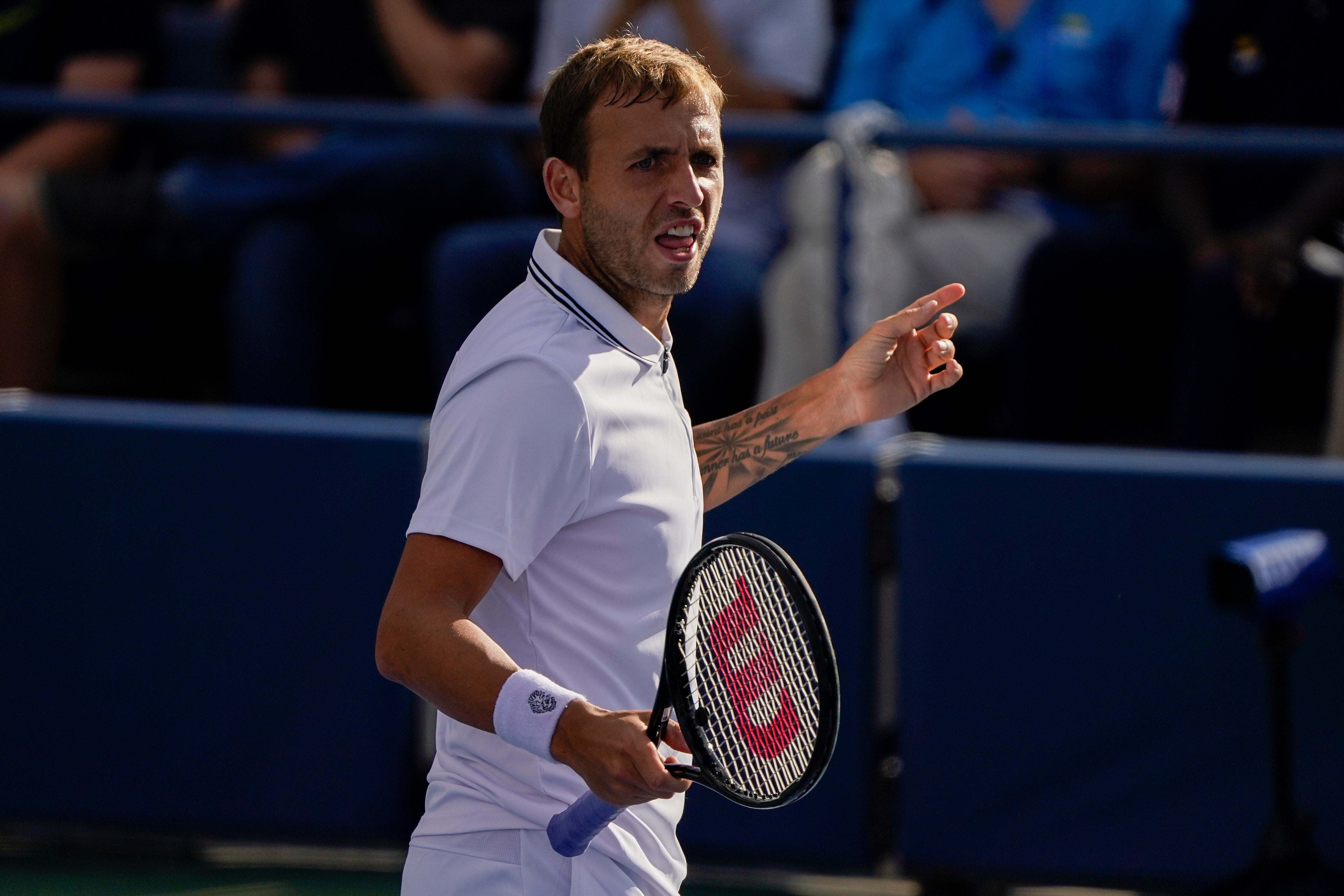 Dan Evans, pictured, bowed out against Daniil Medvedev (John Minchillo/AP)