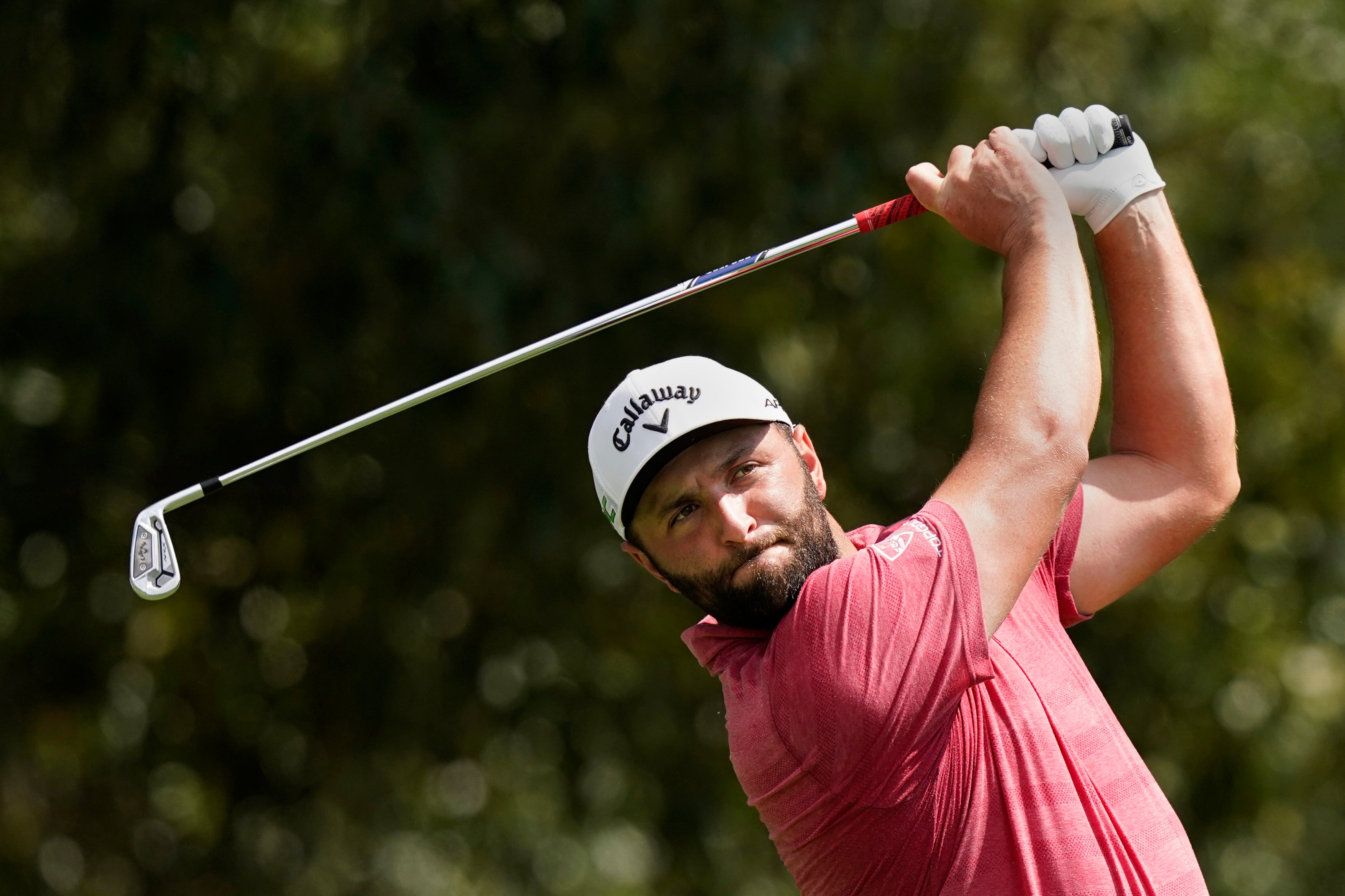 Jon Rahm plays from the fairway on the third hole during the final round of the Tour Championship (Brynn Anderson/AP)