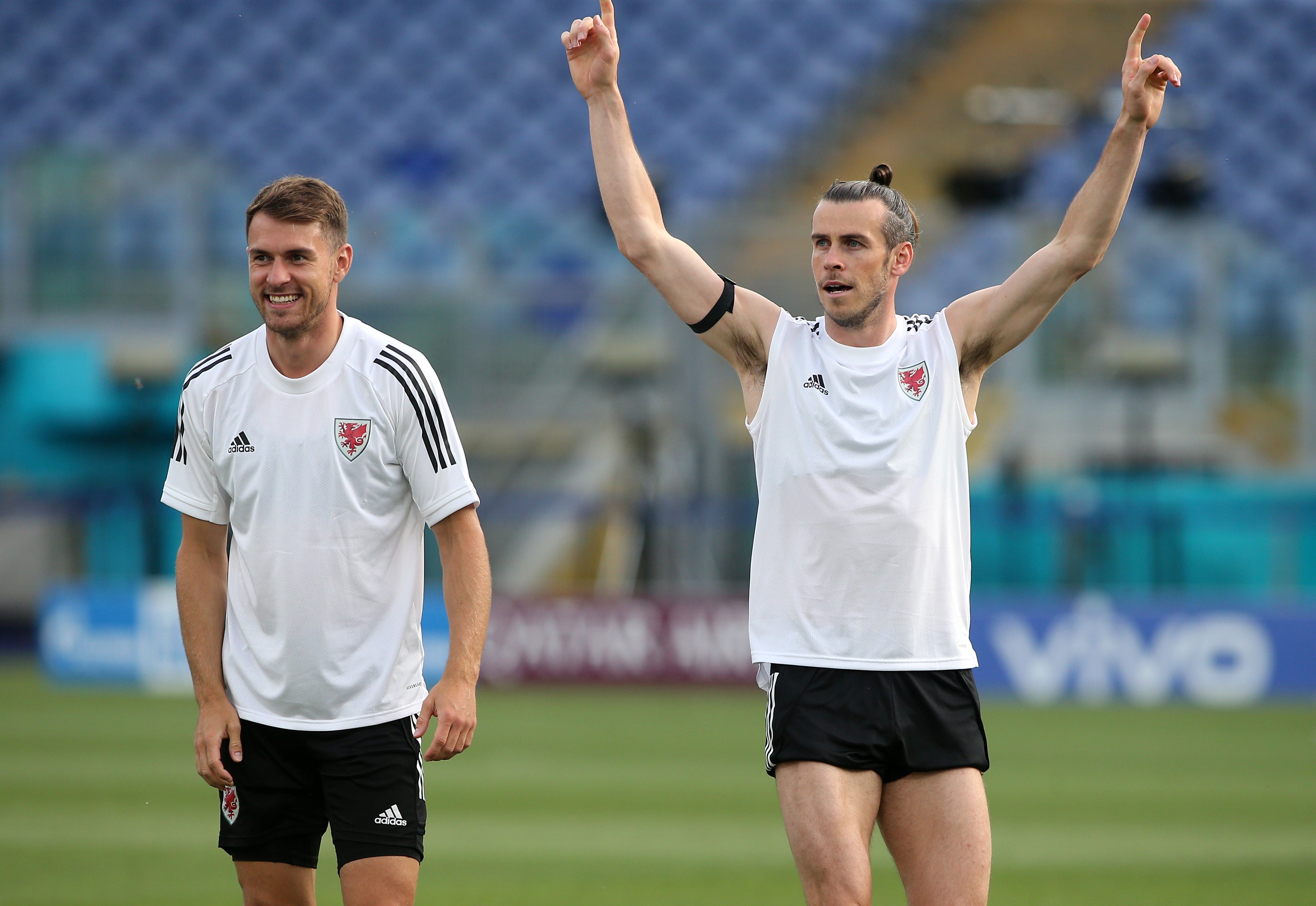 The rise of Wales over the last decade due to players like Aaron Ramsey (left) and Gareth Bale (right) have encouraged the South Asian community to support the national team (Marco Iacobucci/PA)