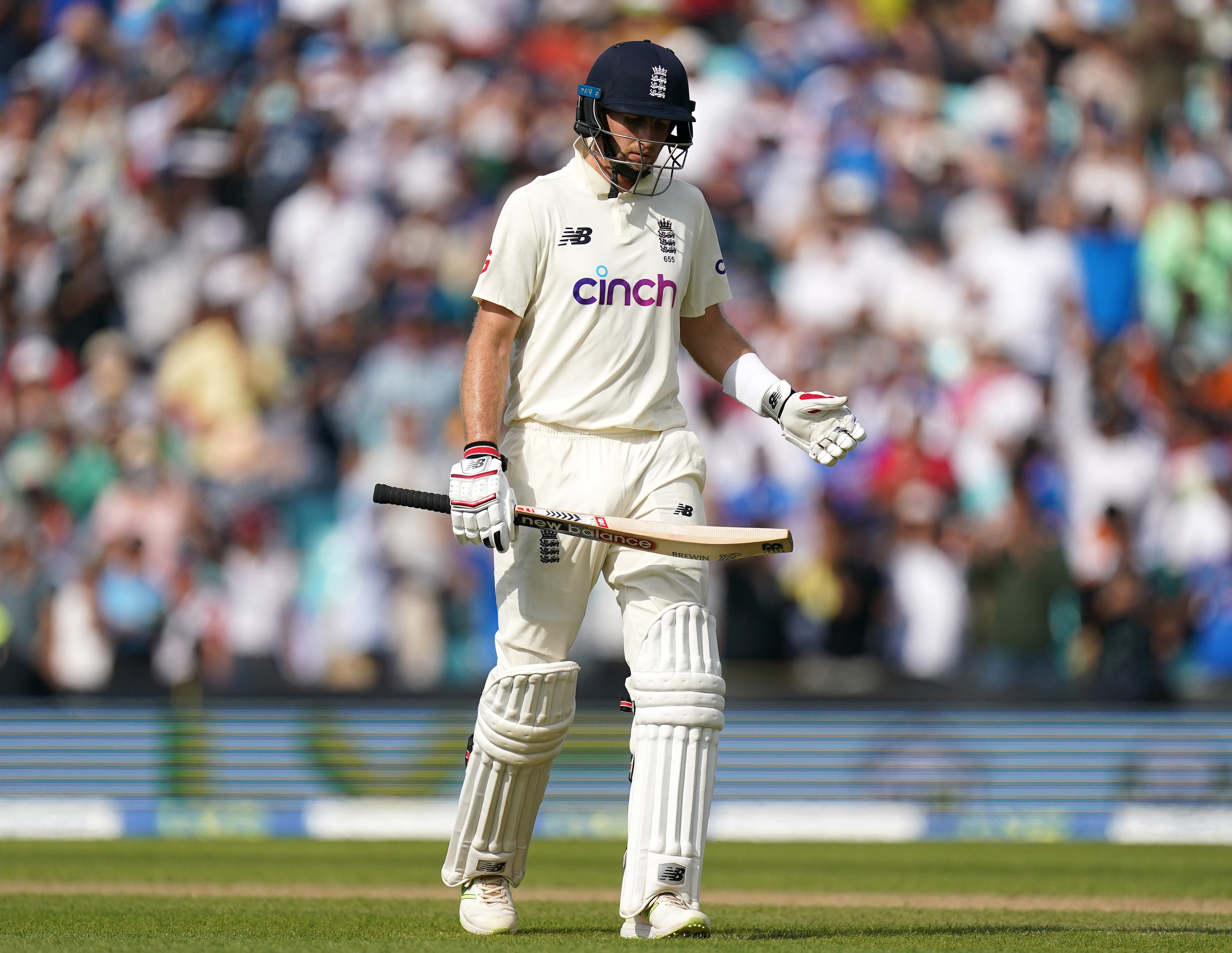 England’s Joe Root reacts after being bowled out by India’s Shardul Thakur (Adam Davy/PA)