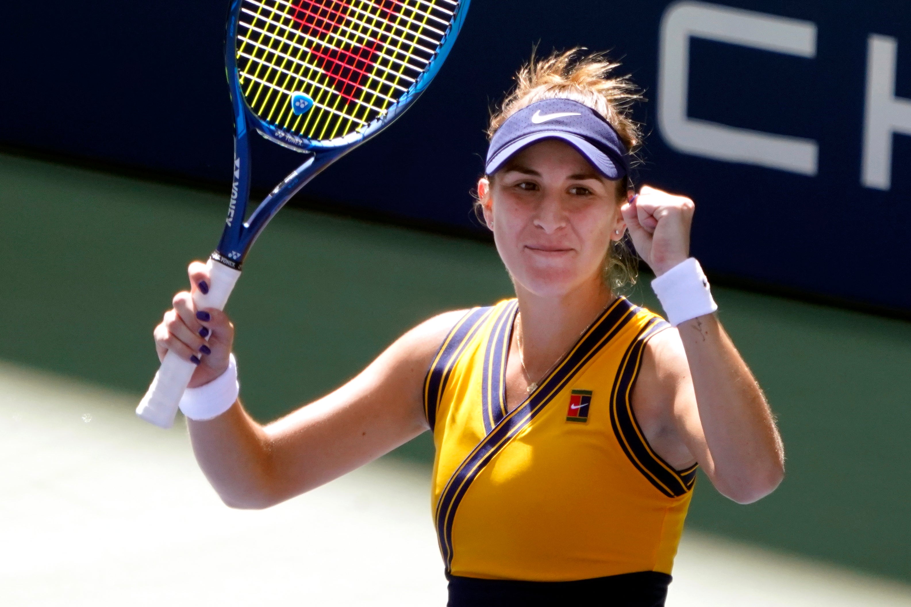 Belinda Bencic celebrates victory over Iga Swiatek (Elise Amendola/AP)